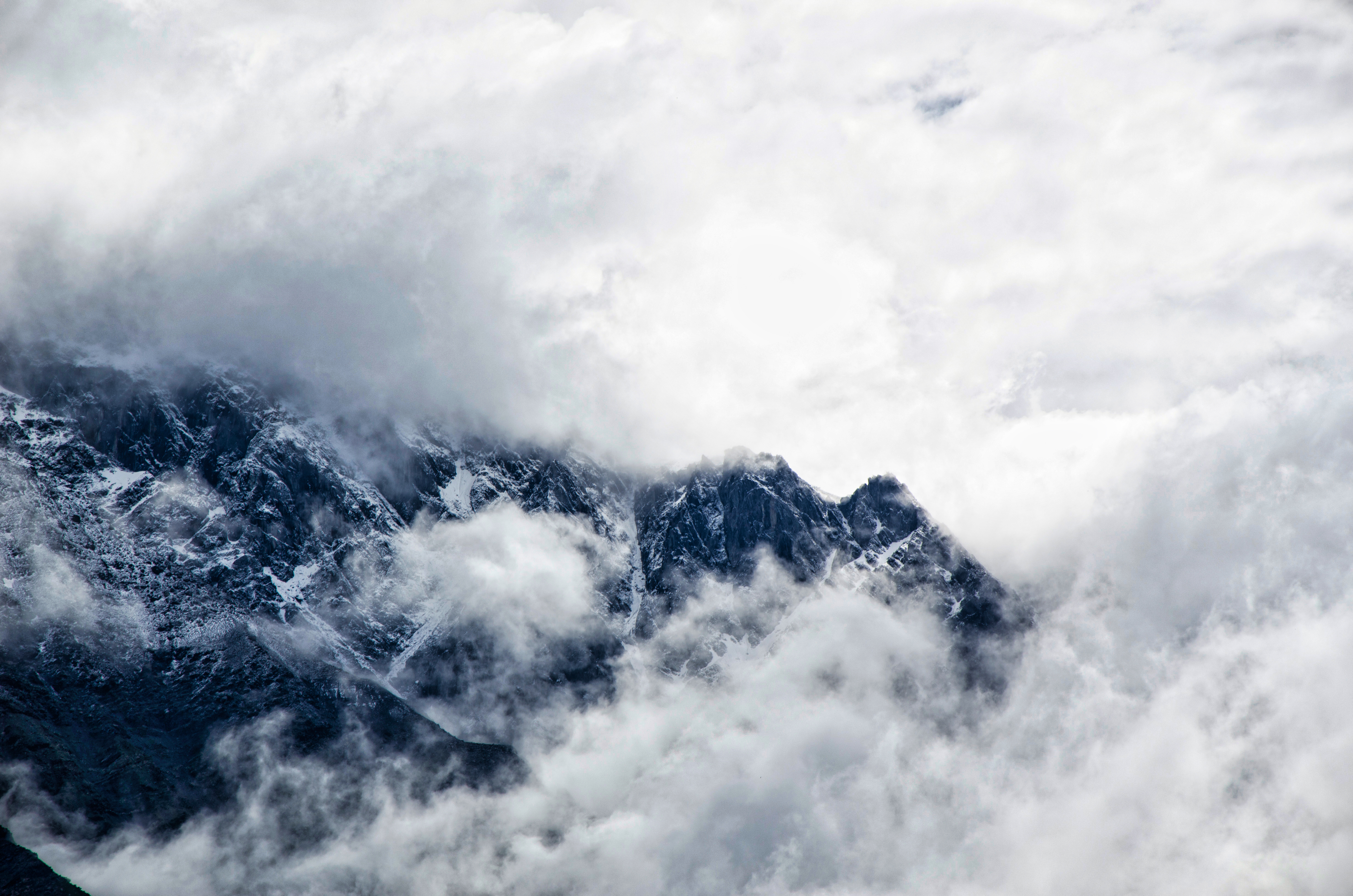 Download mobile wallpaper Clouds, Mountains, Fog, Nature for free.