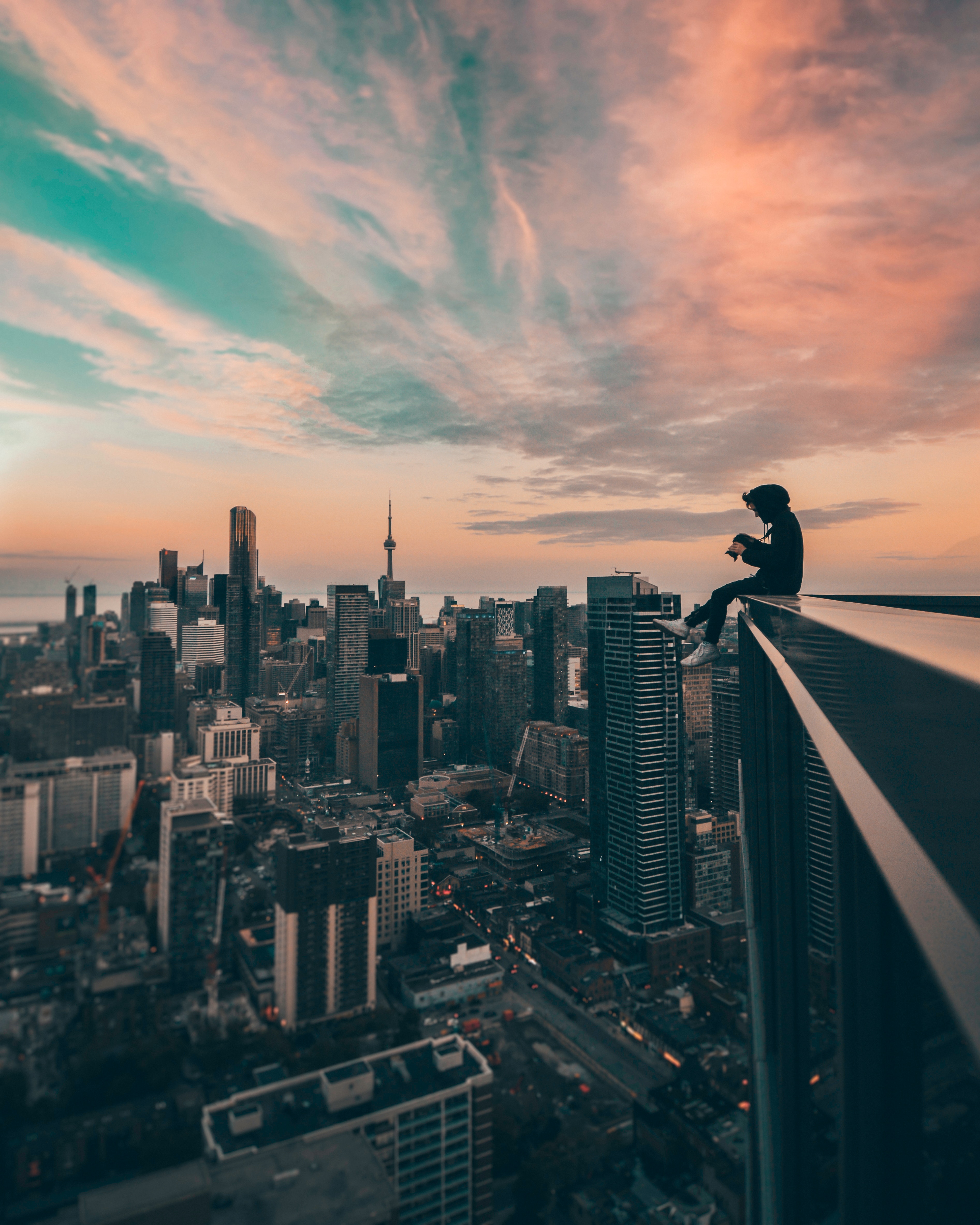 vertical wallpaper human, roof, cities, skyscrapers, height, person