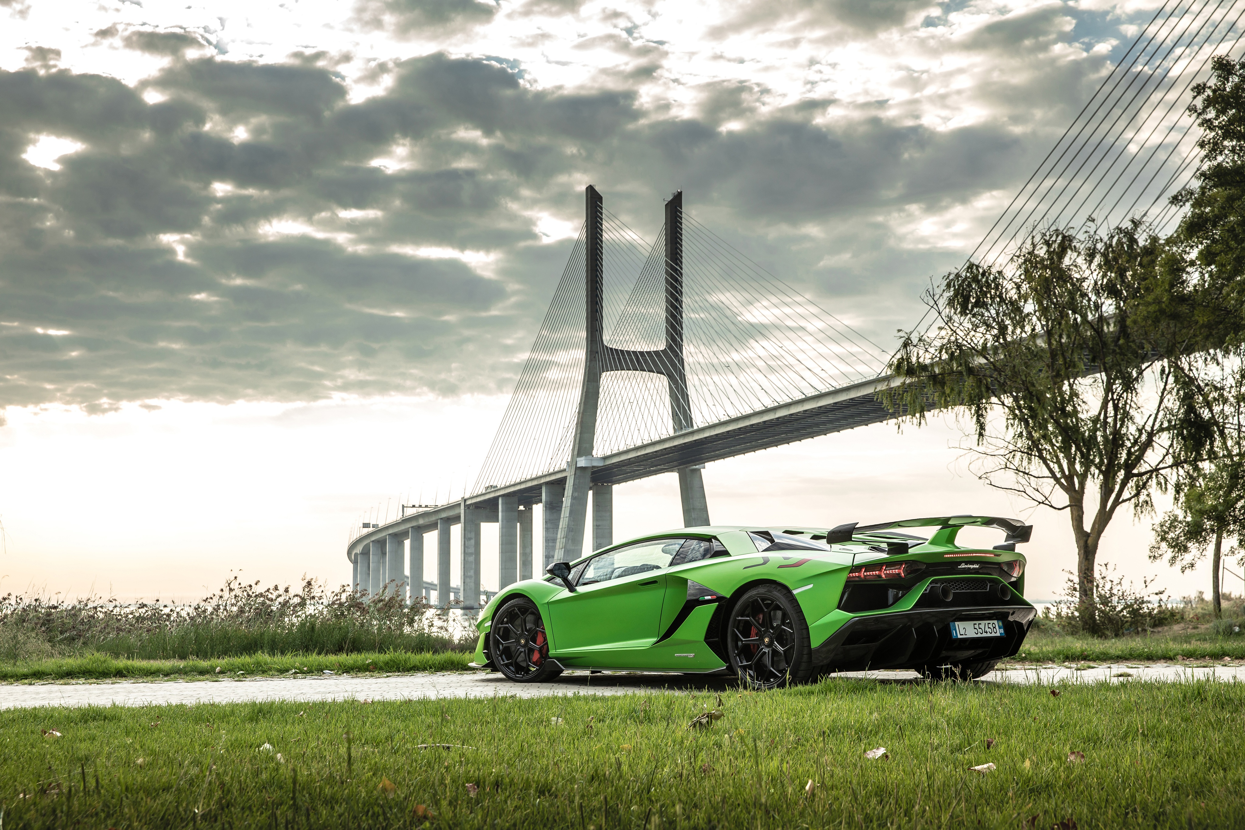 Download mobile wallpaper Lamborghini, Car, Bridge, Supercar, Lamborghini Aventador, Vehicles, Green Car, Lamborghini Aventador Svj for free.