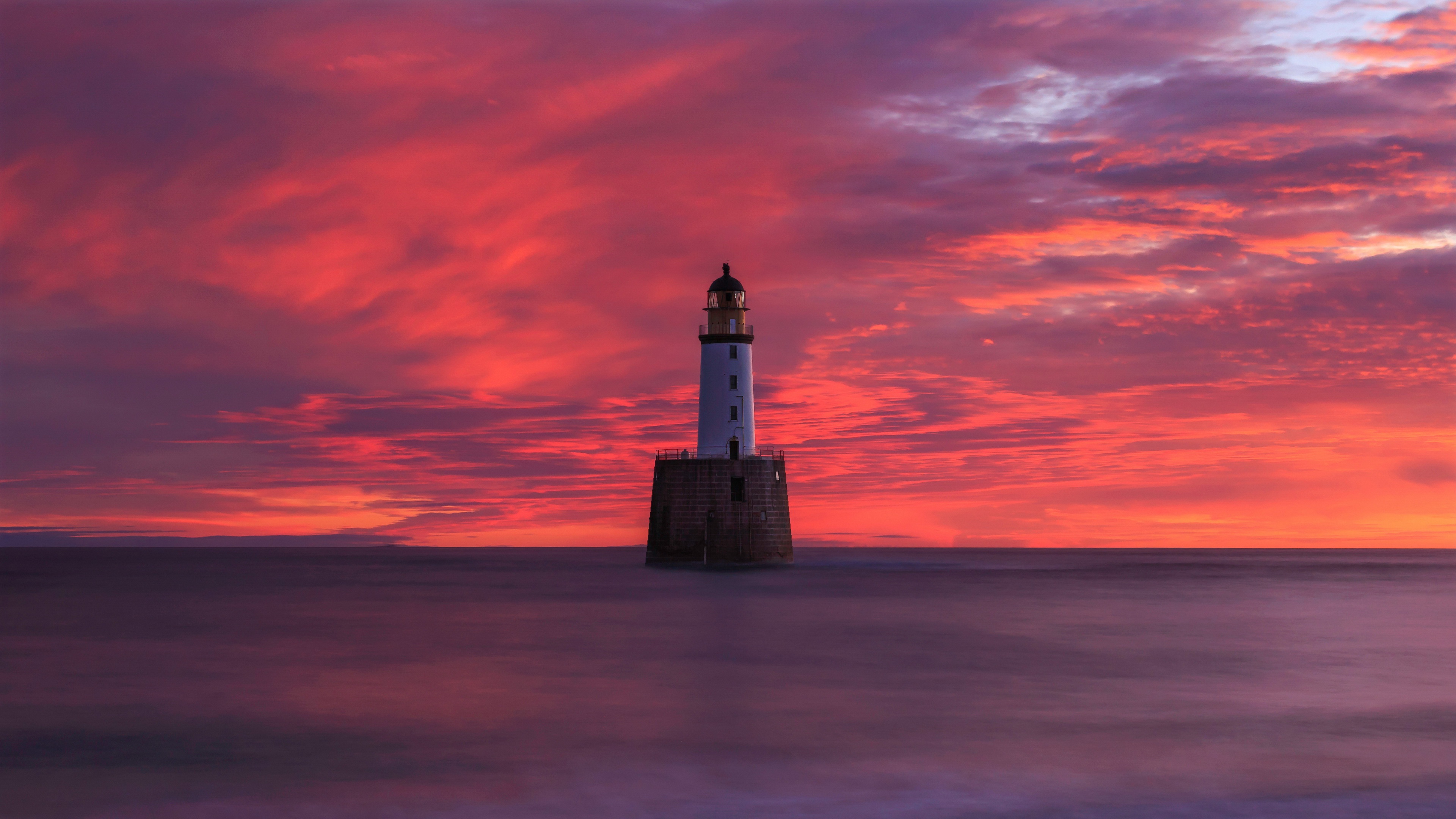 Download mobile wallpaper Sunset, Sky, Horizon, Lighthouse, Man Made for free.