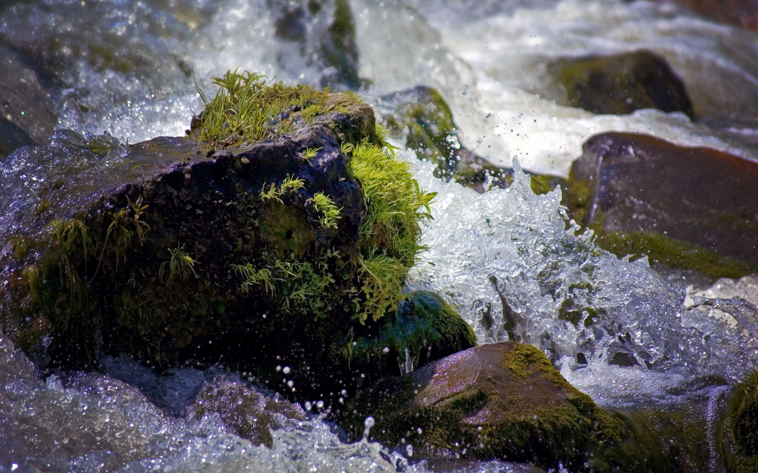 Download mobile wallpaper Stones, Spray, Rivers, Moss, Water, Drops, Nature for free.