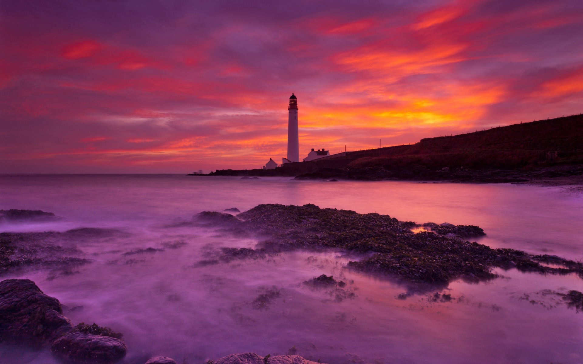Download mobile wallpaper Sunset, Sky, Pink, Ocean, Purple, Lighthouse, Man Made for free.