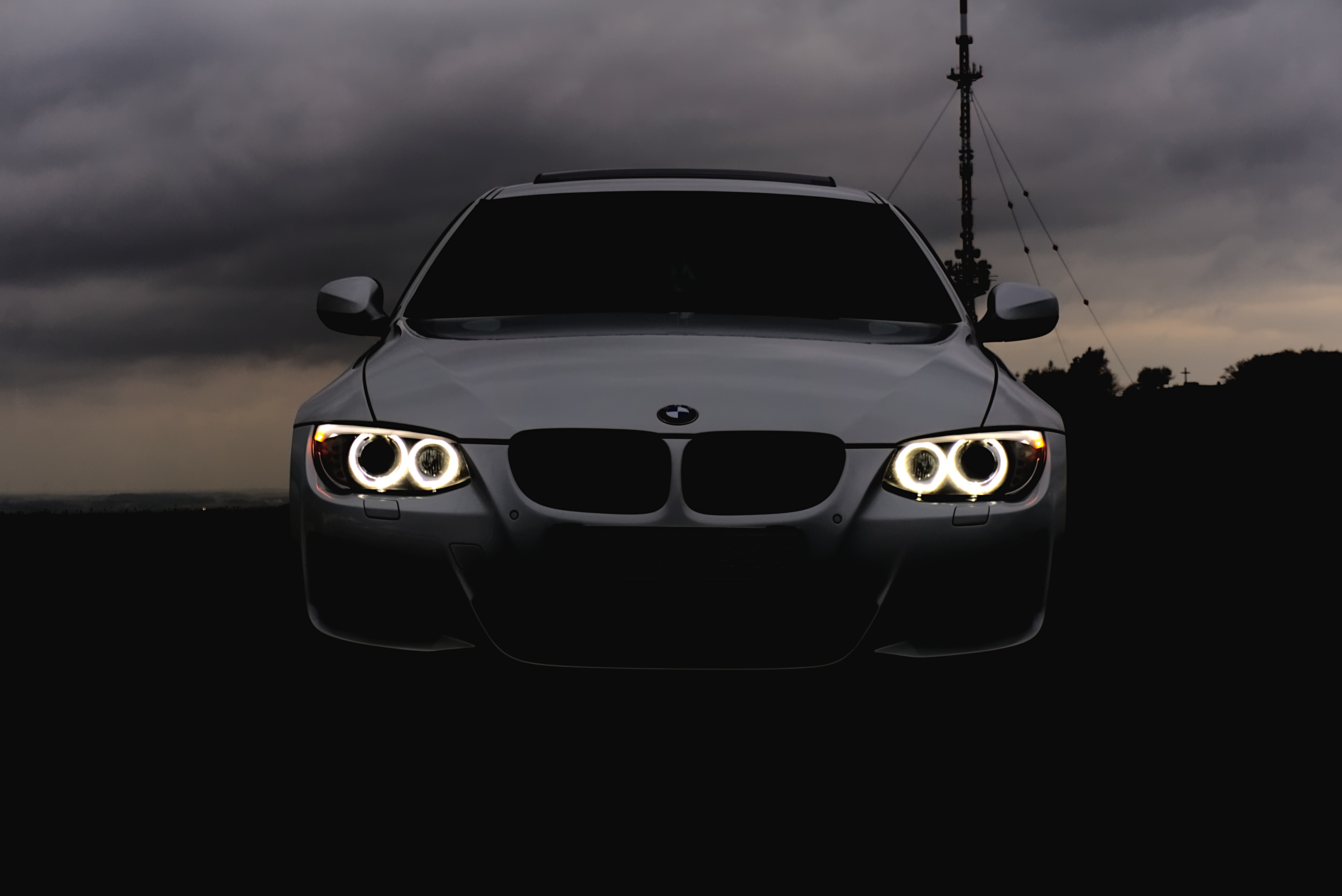 car, bmw, cars, clouds, lights, mainly cloudy, overcast, headlights Panoramic Wallpaper