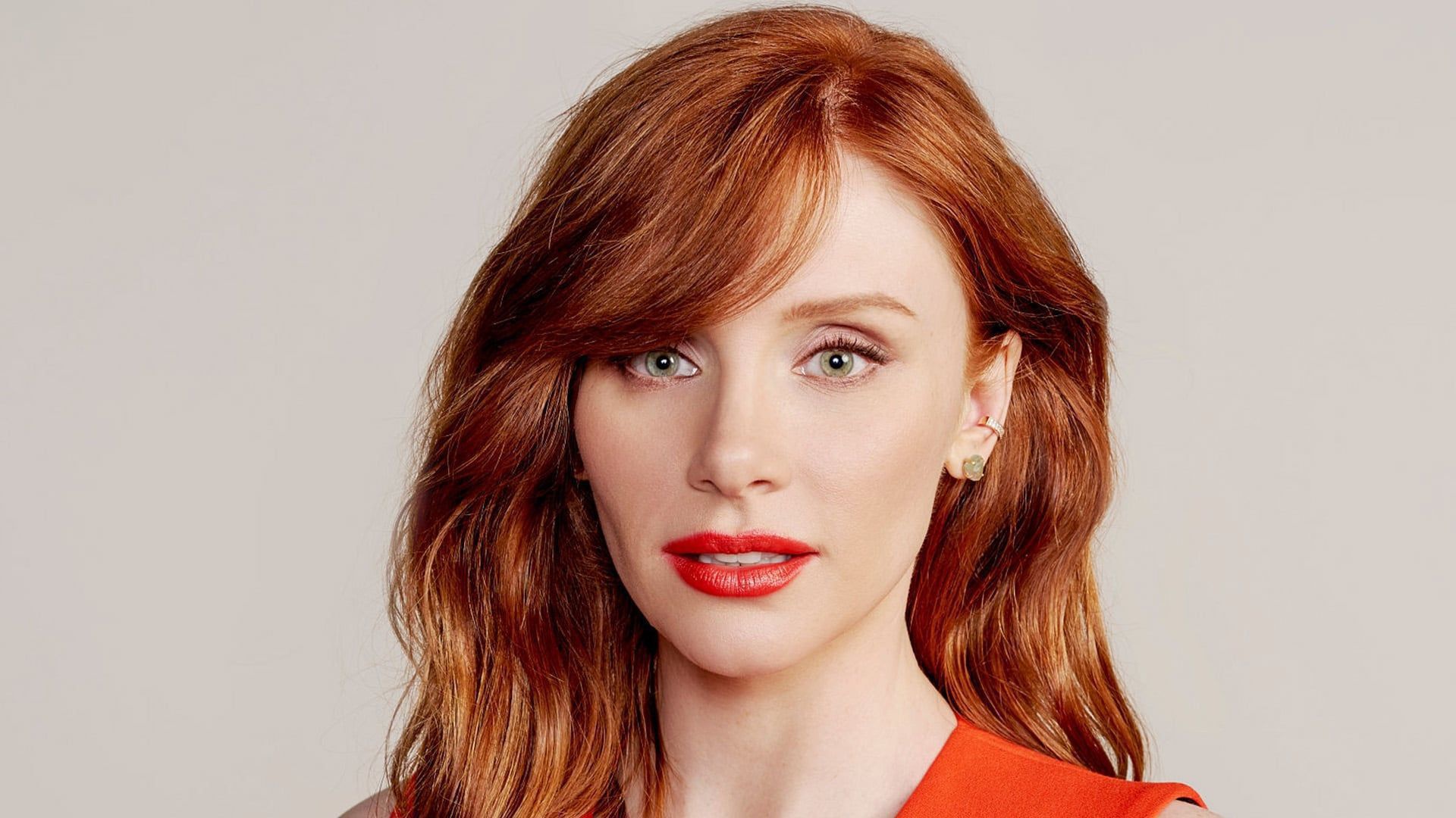 Download mobile wallpaper Redhead, Face, Green Eyes, American, Celebrity, Actress, Lipstick, Bryce Dallas Howard for free.