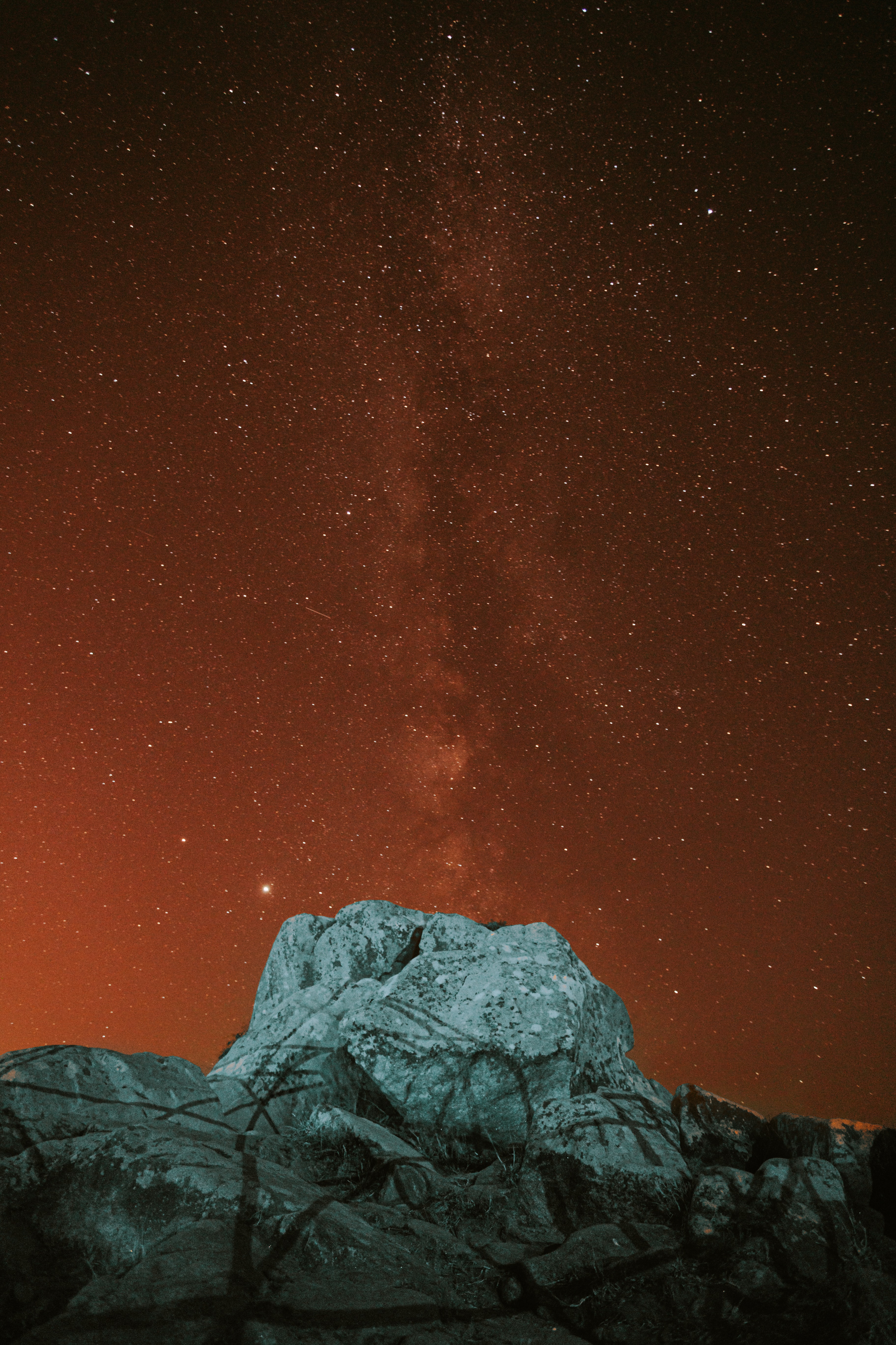Download mobile wallpaper Rock, Stone, Nature, Stars, Nebula, Starry Sky, Night for free.
