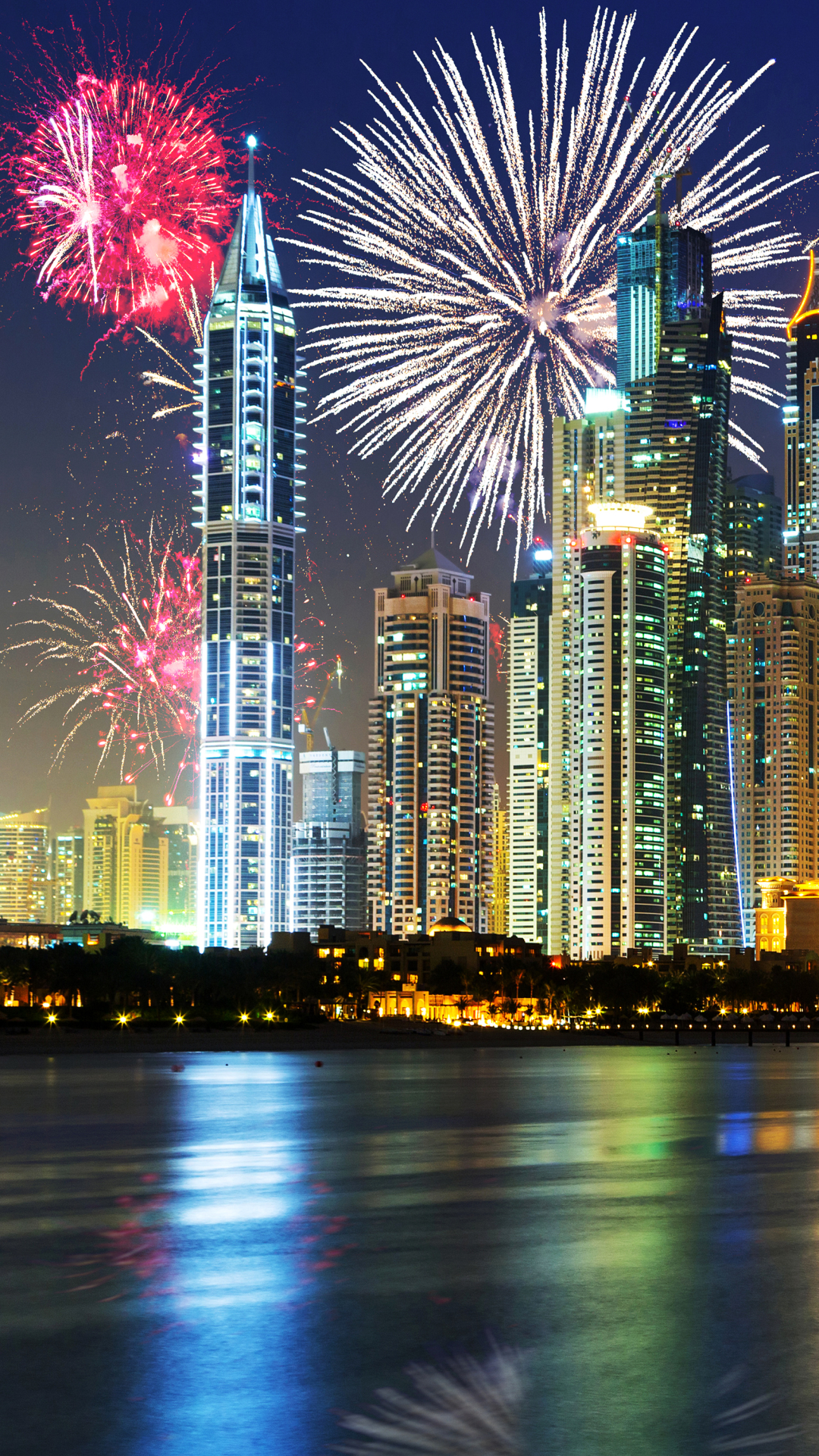 Download mobile wallpaper Night, Building, Dubai, Colorful, Cityscape, Fireworks, Photography for free.