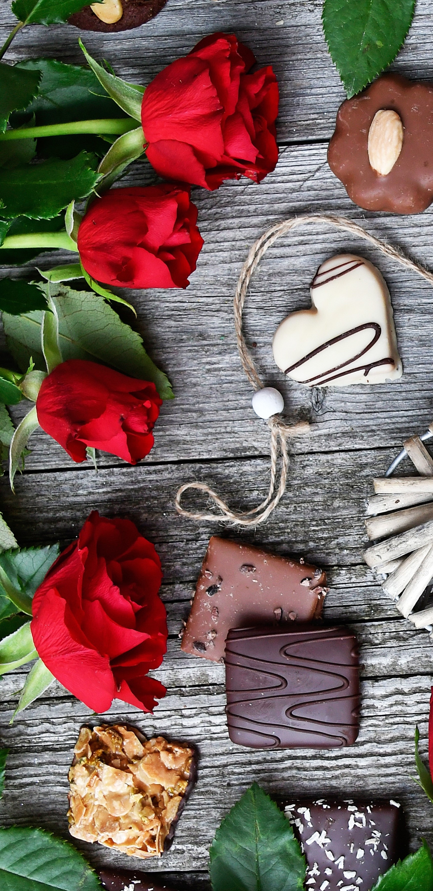 Download mobile wallpaper Valentine's Day, Chocolate, Still Life, Flower, Rose, Photography, Red Flower, Heart Shaped for free.