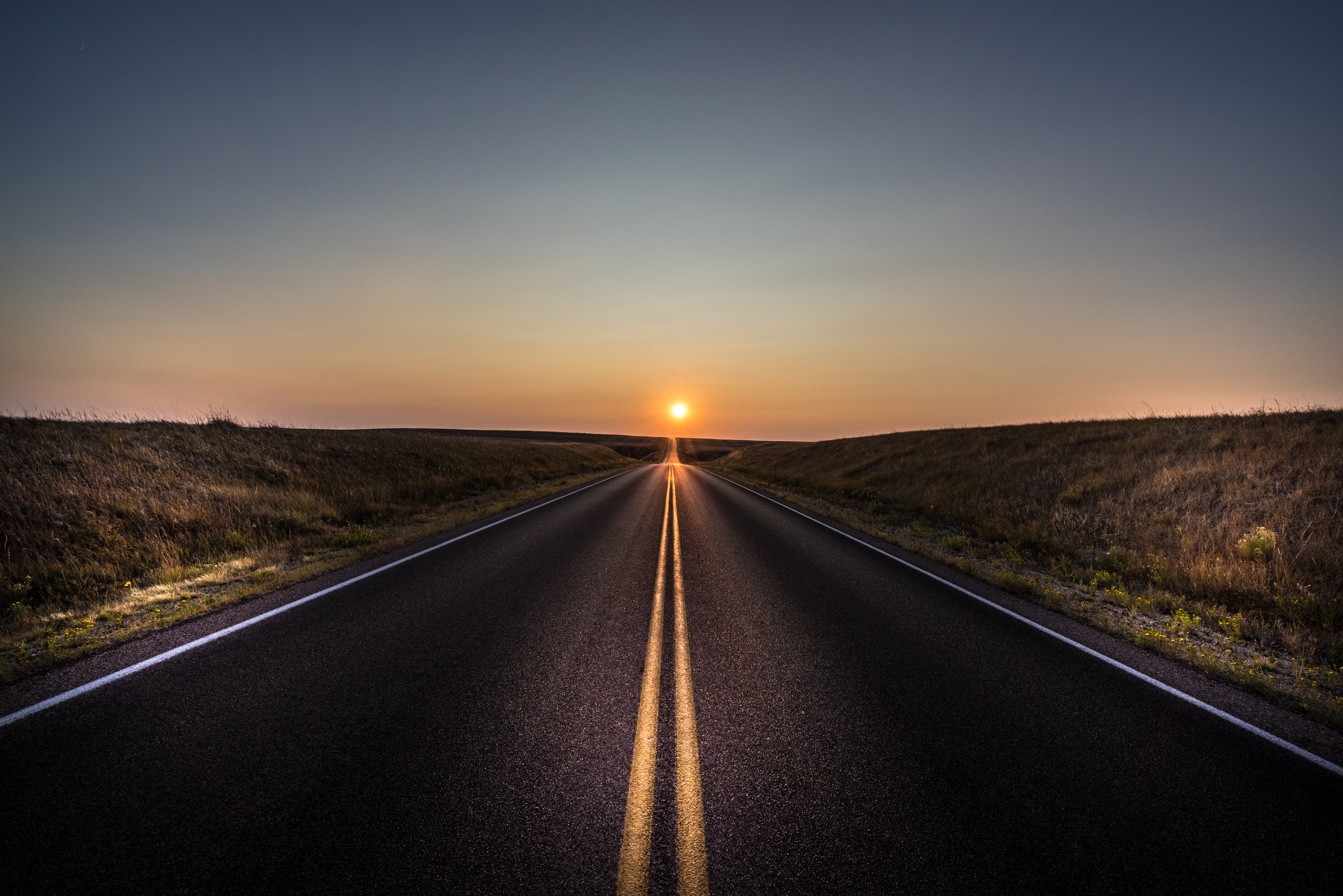 Download mobile wallpaper Sunset, Road, Man Made for free.