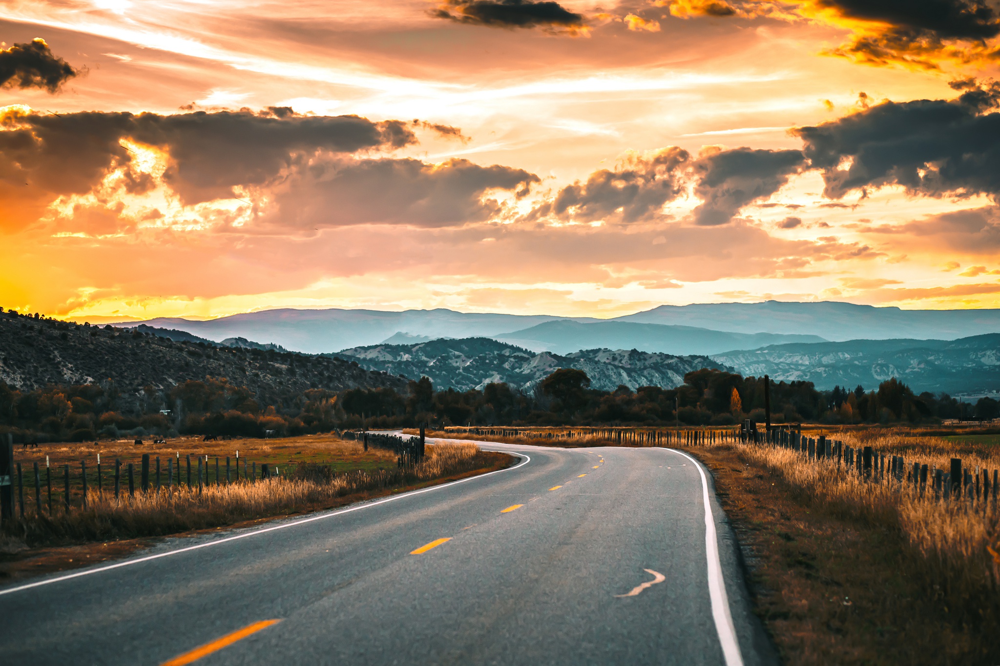 Free download wallpaper Landscape, Nature, Sunset, Road, Cloud, Man Made on your PC desktop