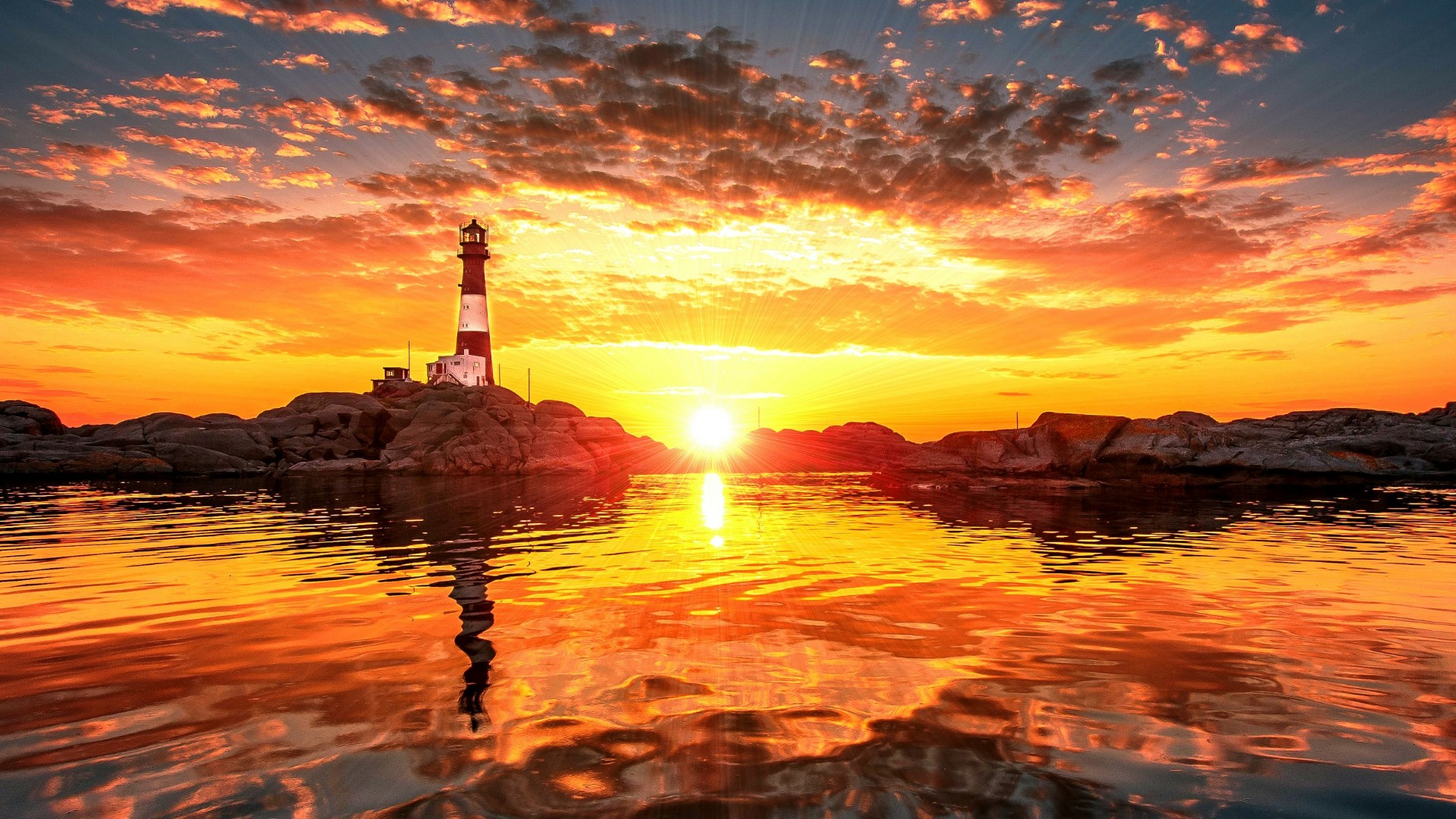 Free download wallpaper Sunset, Reflection, Lighthouse, Man Made on your PC desktop