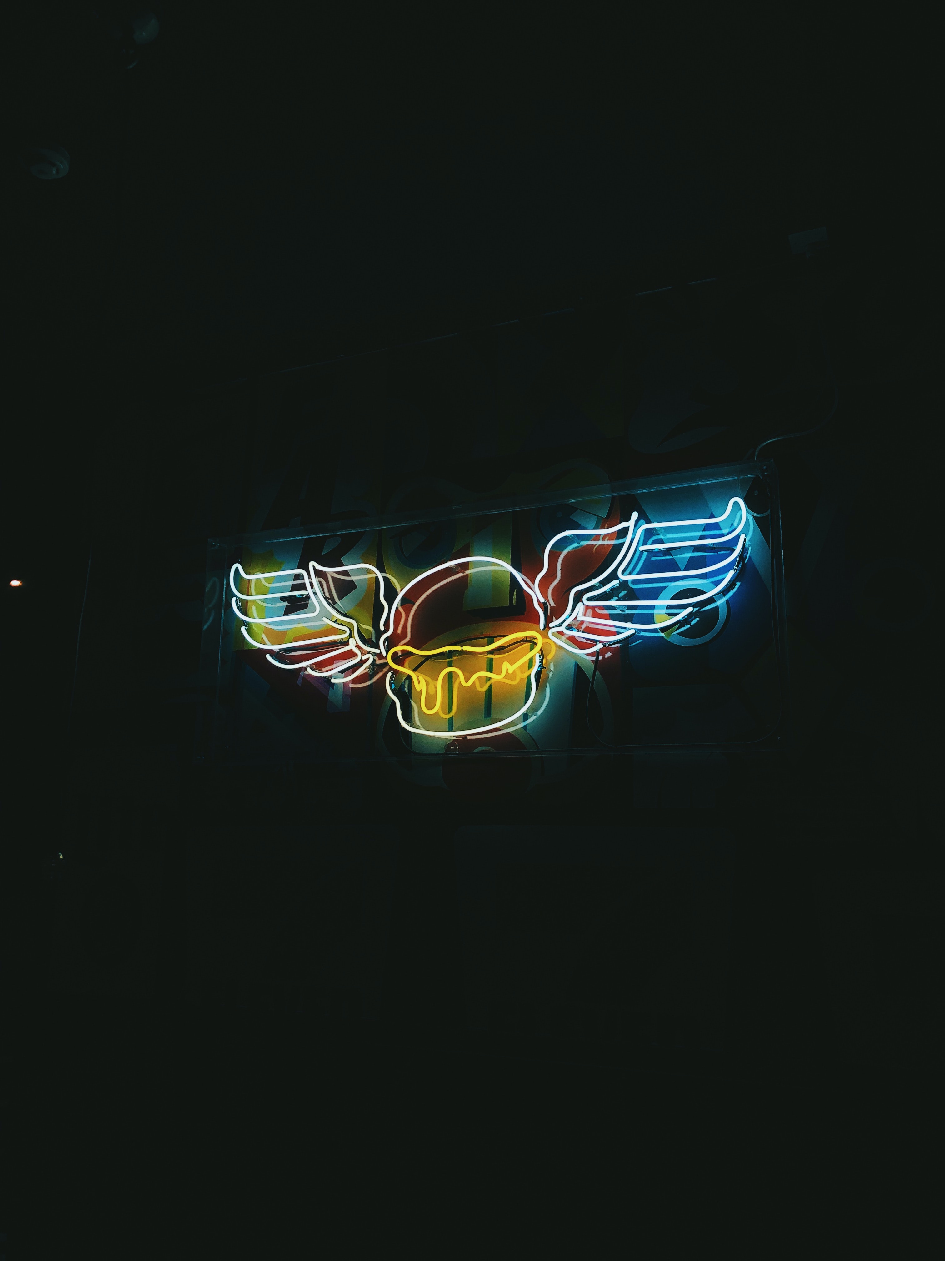 Download mobile wallpaper Illumination, Backlight, Signboard, Sign, Wings, Night, Neon, Dark for free.