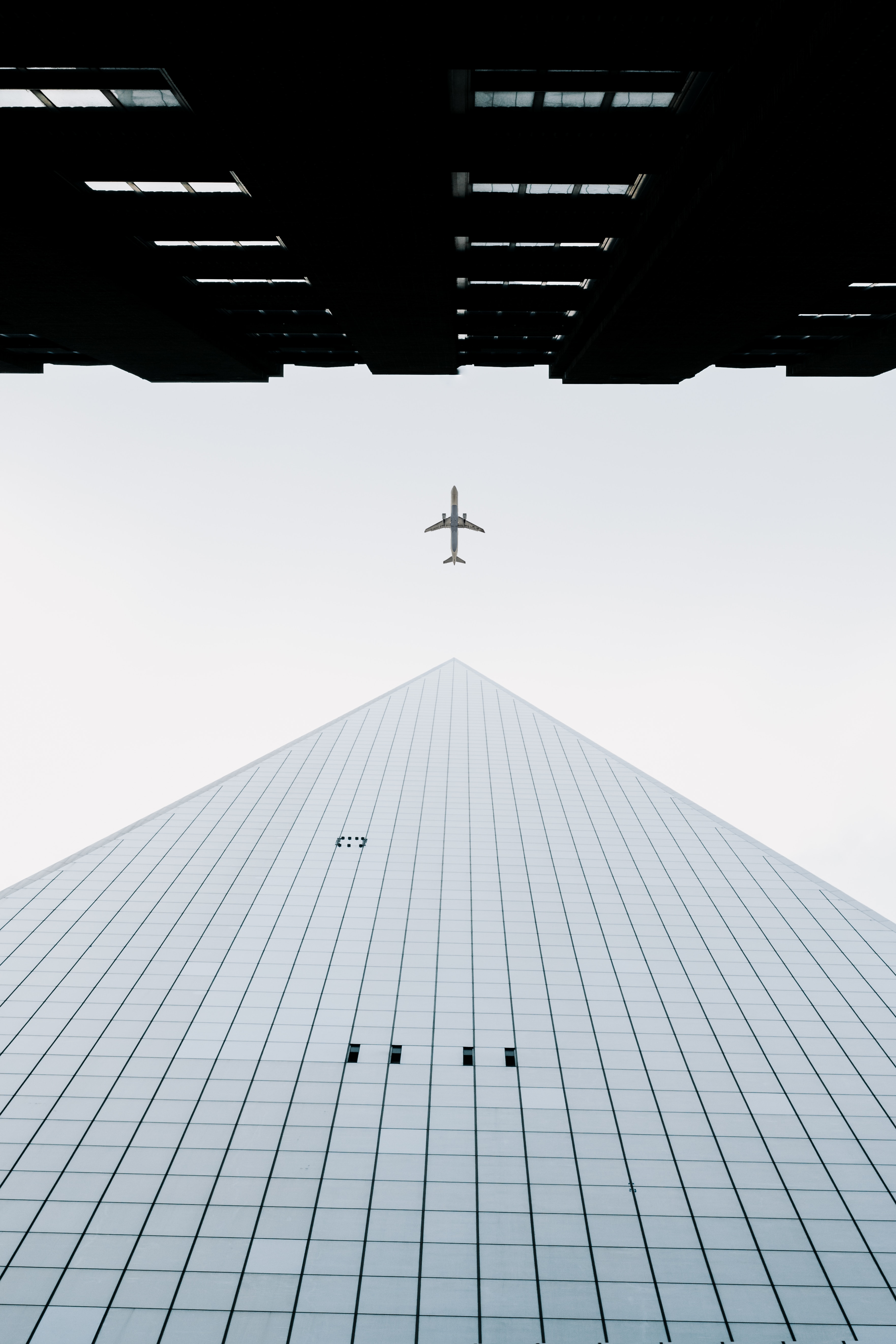 Download mobile wallpaper Building, Sky, Airplane, Plane, Minimalism for free.