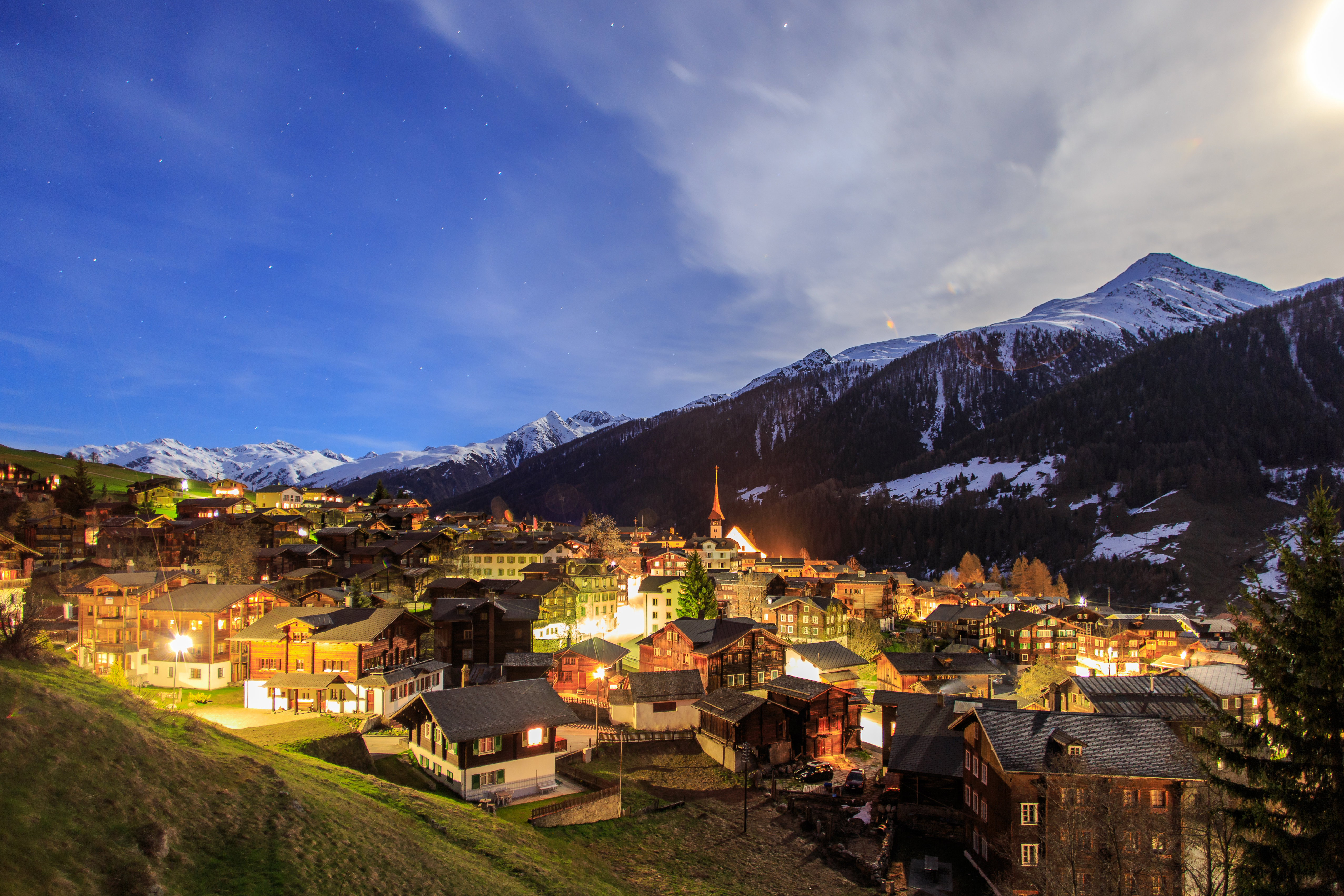 Free download wallpaper Night, Mountain, Light, House, Switzerland, Town, Man Made, Towns on your PC desktop