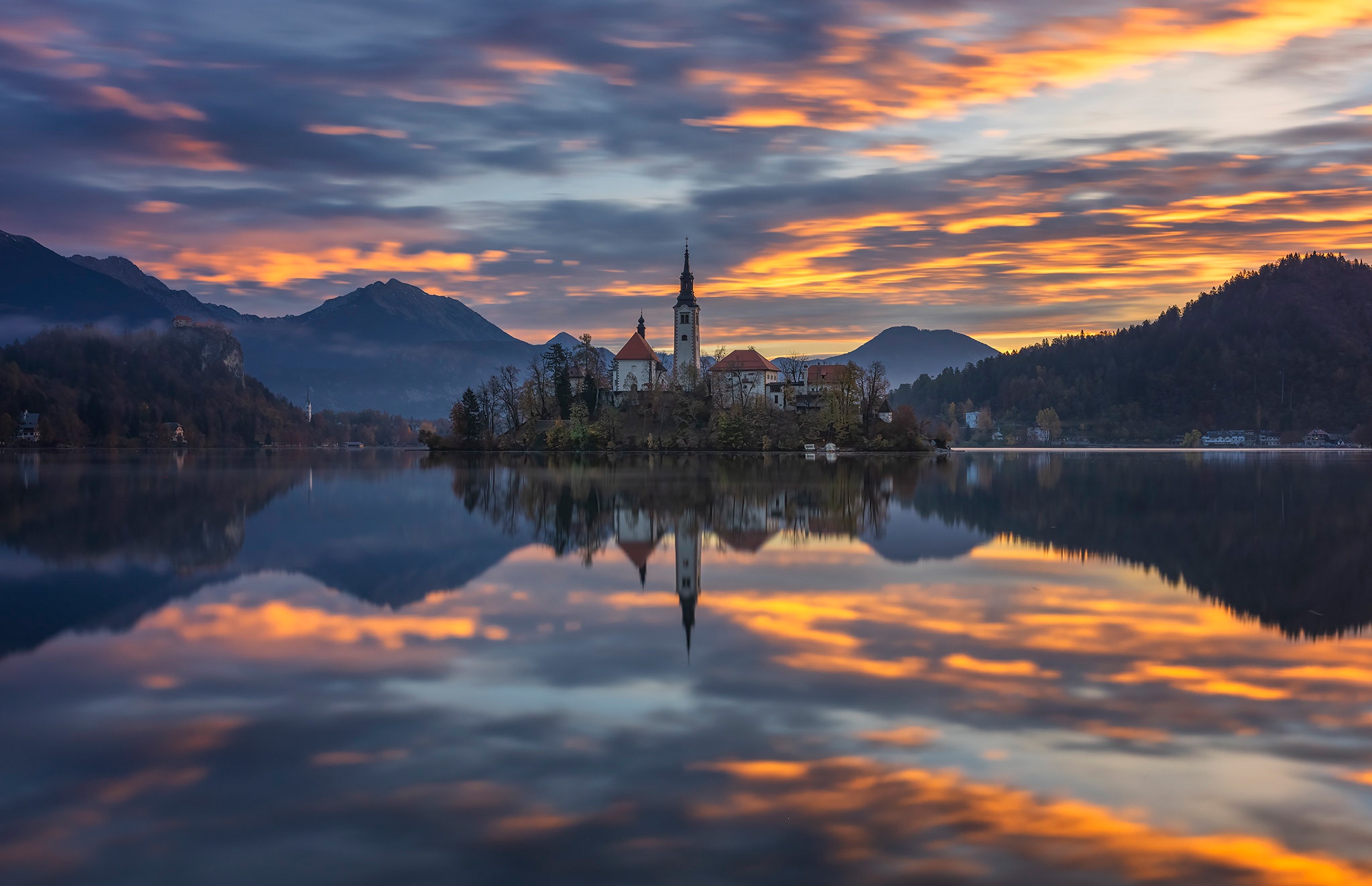 Download mobile wallpaper Dawn, Mountain, Lake, Reflection, Island, Church, Slovenia, Churches, Lake Bled, Religious, Assumption Of Mary Church for free.