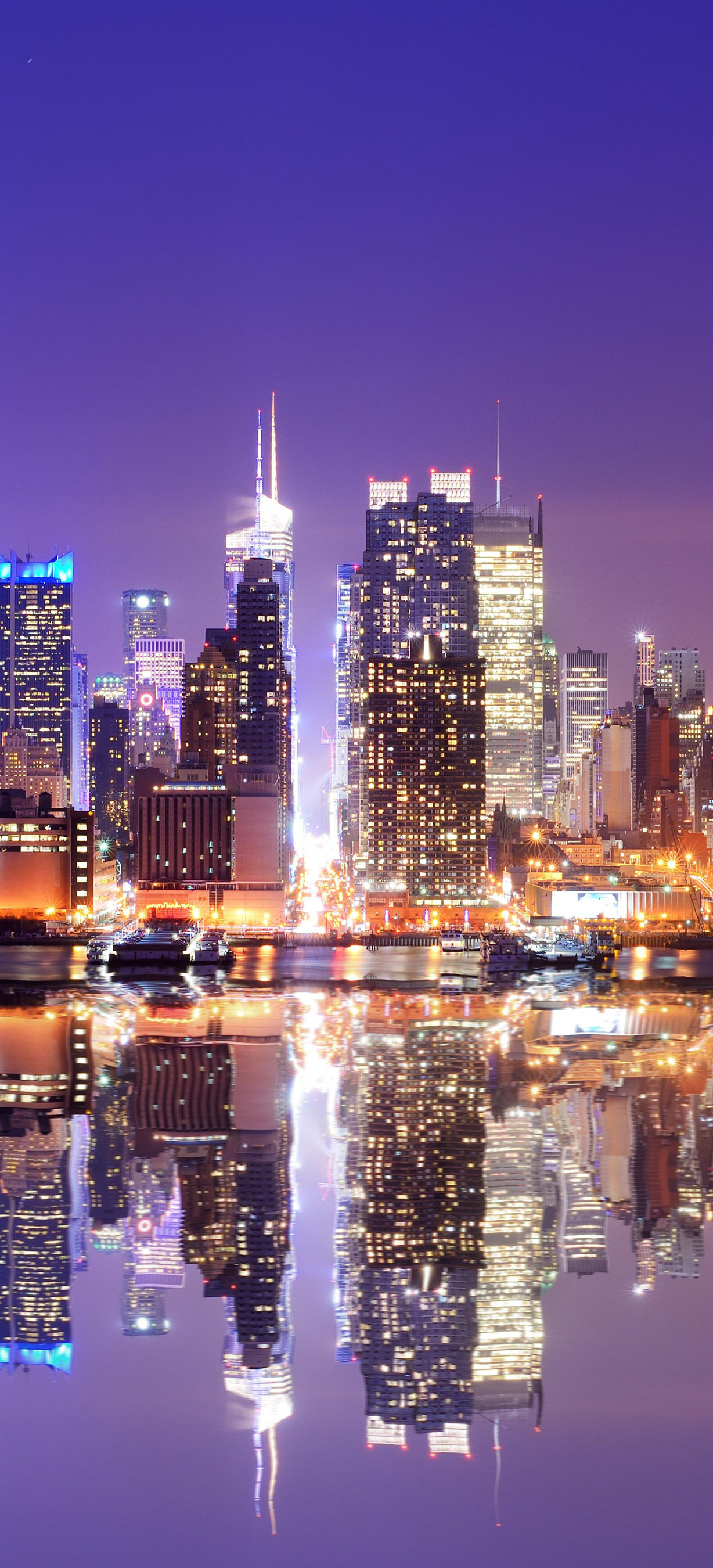 Download mobile wallpaper Cities, Night, Usa, City, Skyscraper, Building, Reflection, New York, Man Made for free.