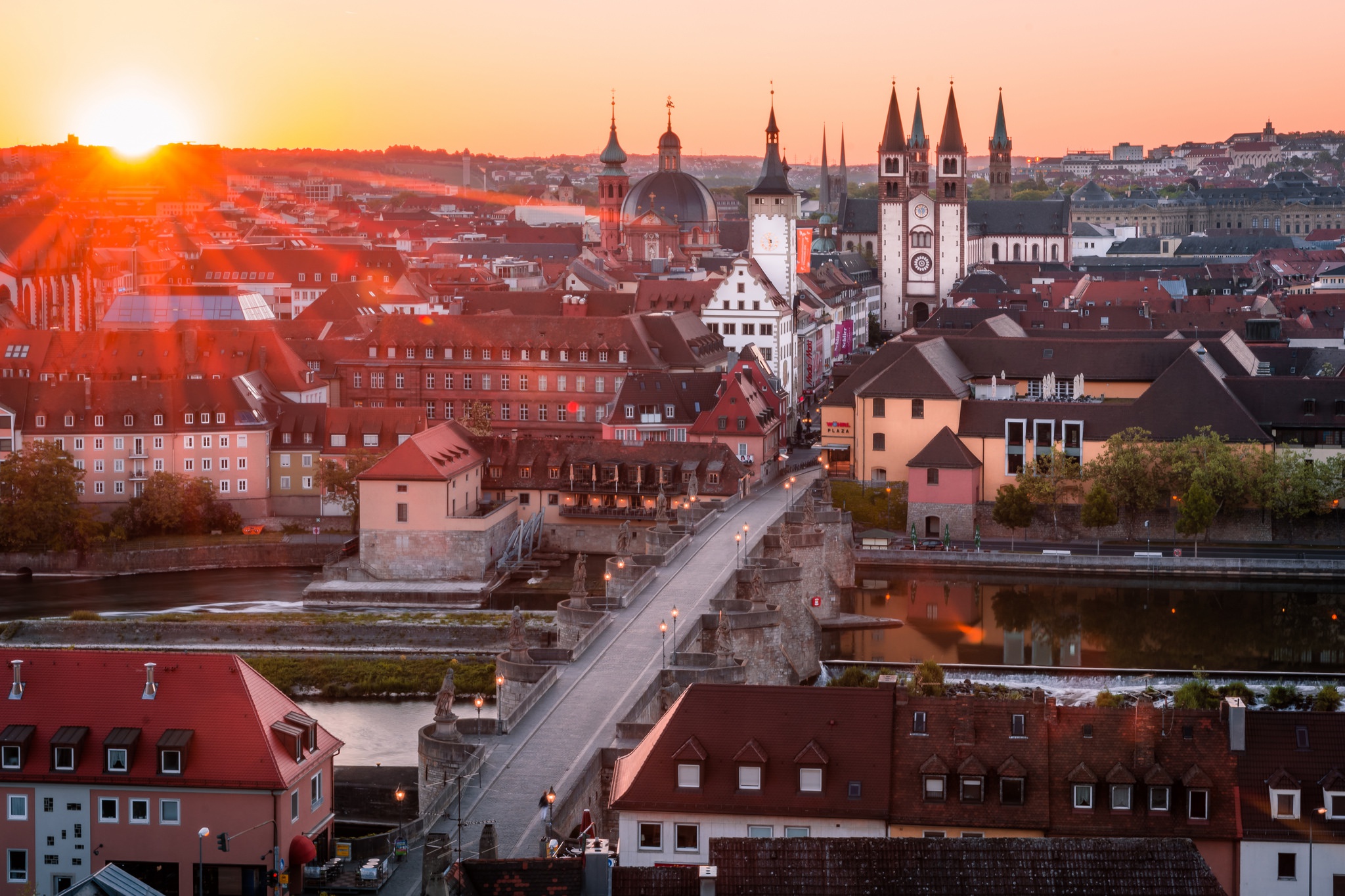 Free download wallpaper Cities, Sunset, City, Building, Bridge, Germany, Man Made, Wurzburg on your PC desktop