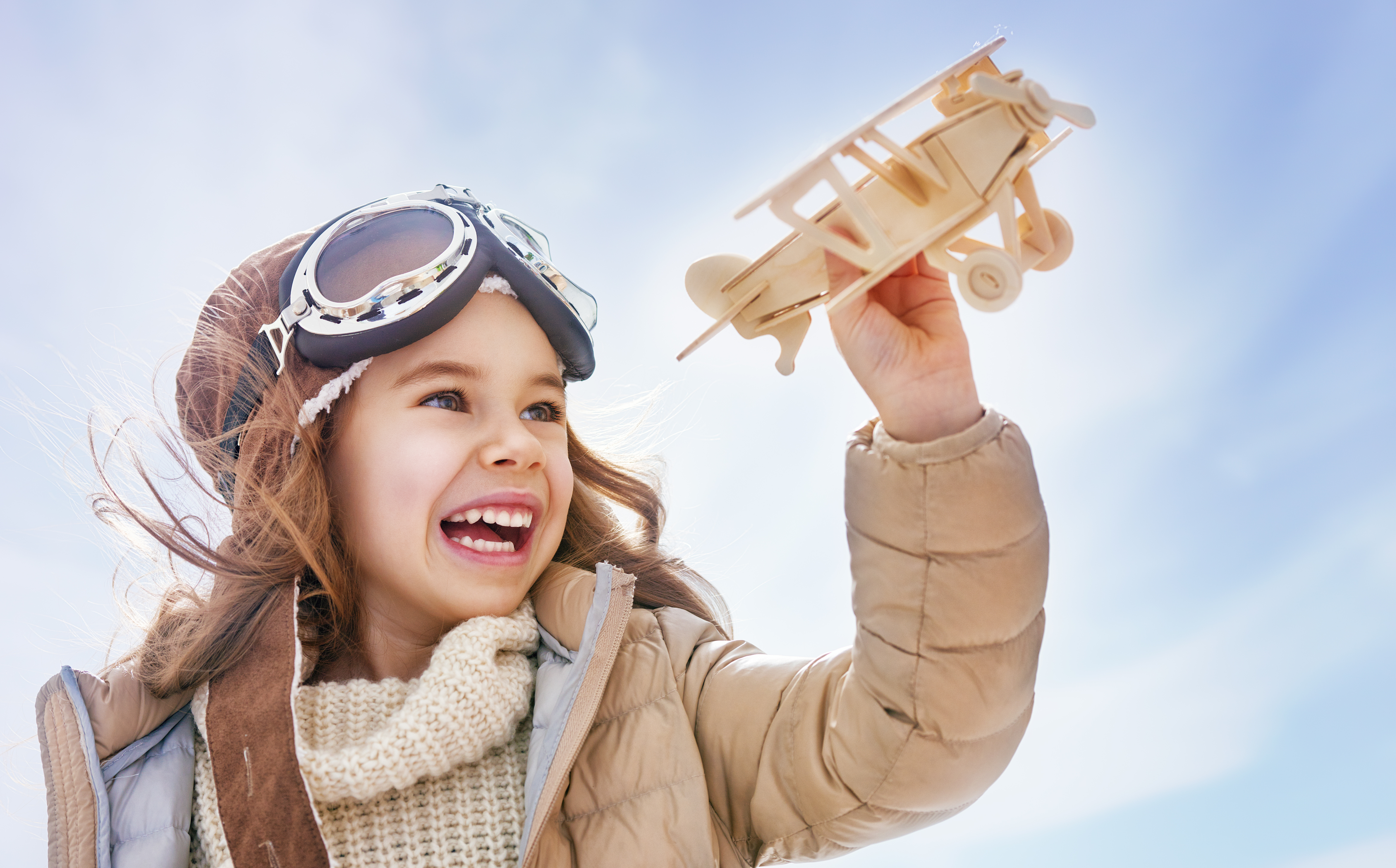 Download mobile wallpaper Toy, Smile, Airplane, Child, Photography, Little Girl, Goggles for free.
