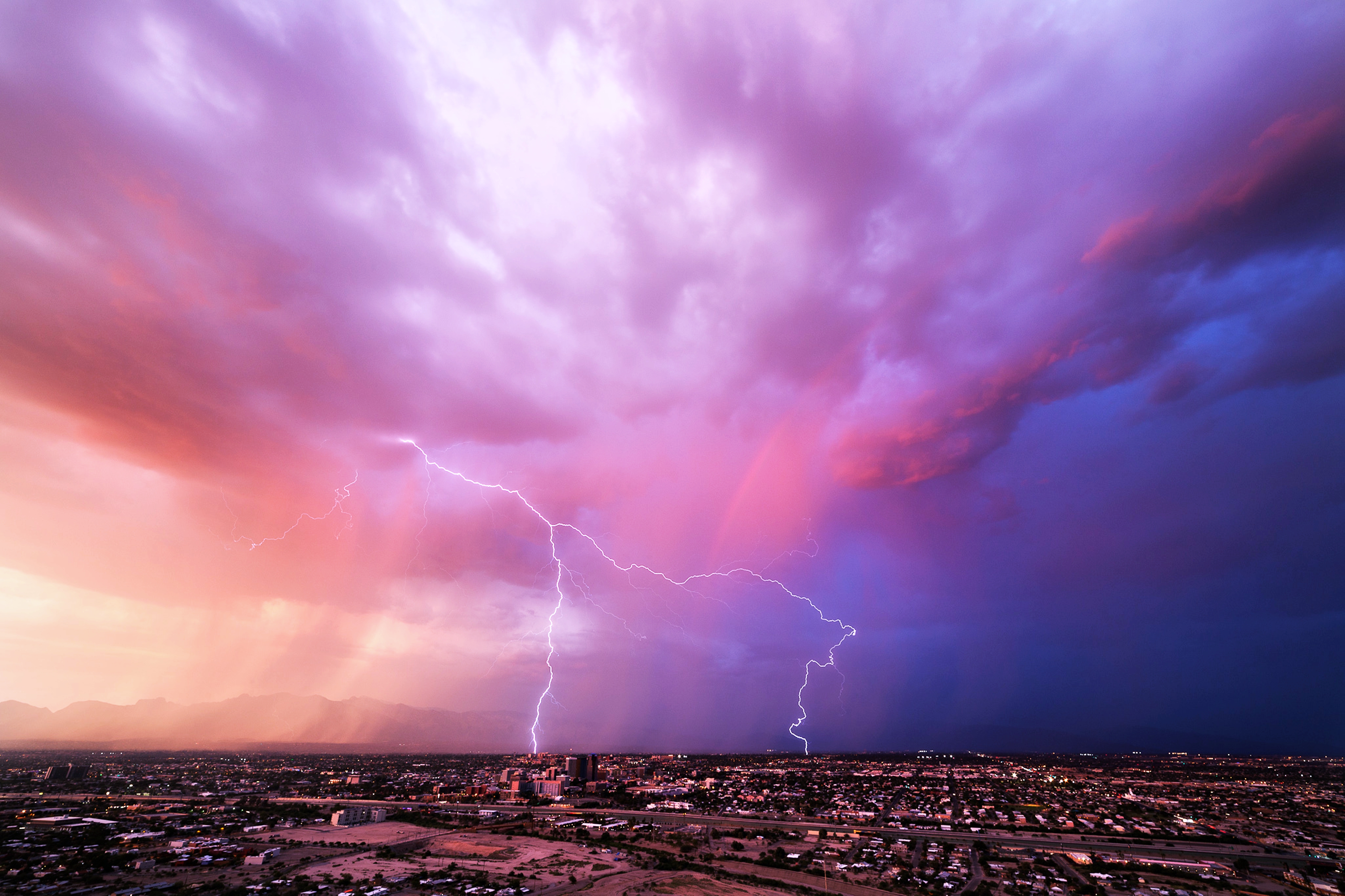 Free download wallpaper Landscape, Lightning, City, Earth, Storm, Cloud on your PC desktop