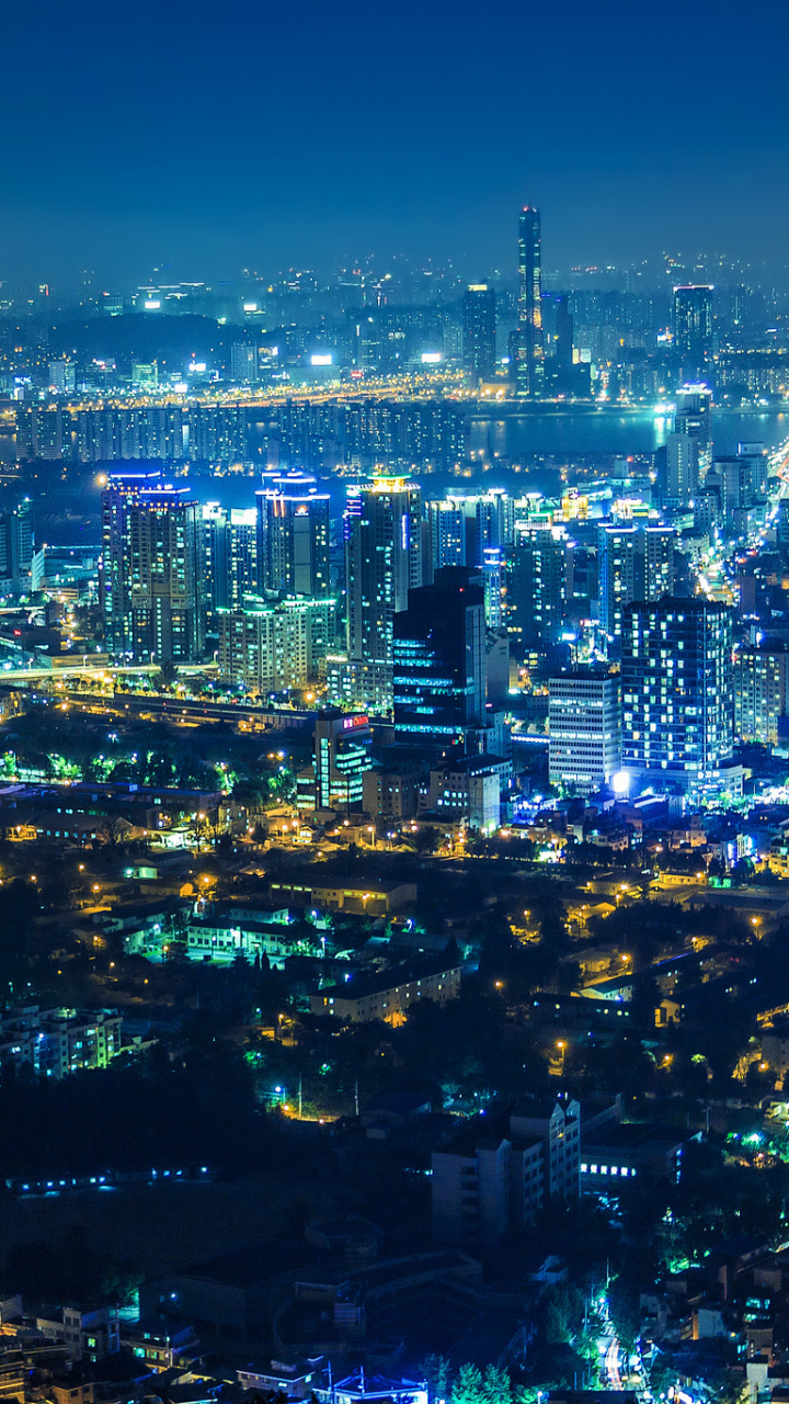Download mobile wallpaper Cities, Night, City, Skyscraper, Building, Light, Cityscape, Seoul, South Korea, Aerial, Man Made for free.