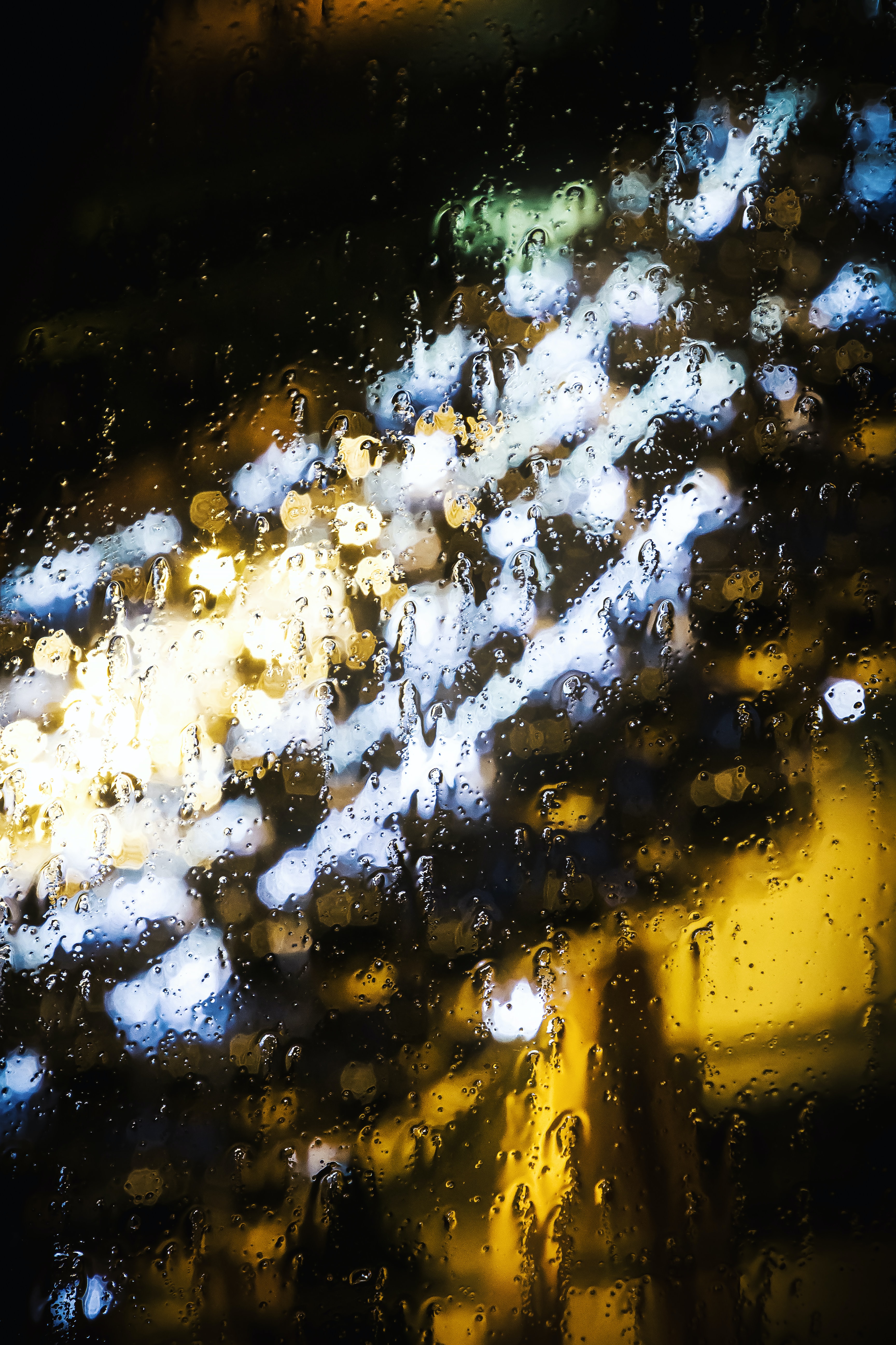 Download mobile wallpaper Lights, Macro, Smooth, Drops, Glass, Blur, Rain for free.
