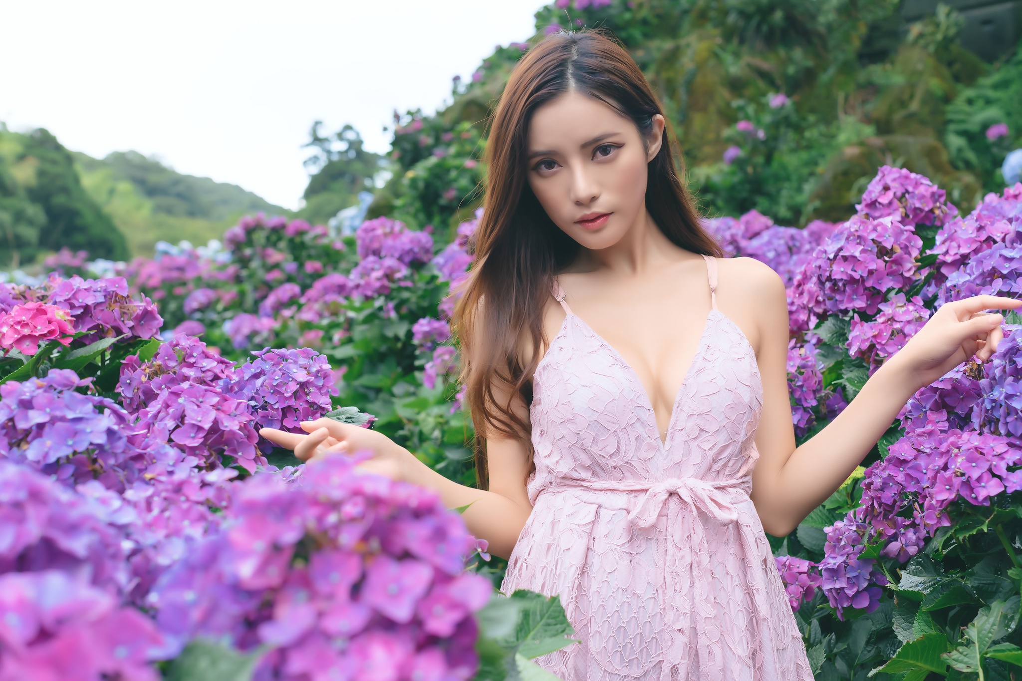 Download mobile wallpaper Flower, Hydrangea, Brunette, Model, Women, Asian, Purple Flower, Long Hair, Pink Dress for free.