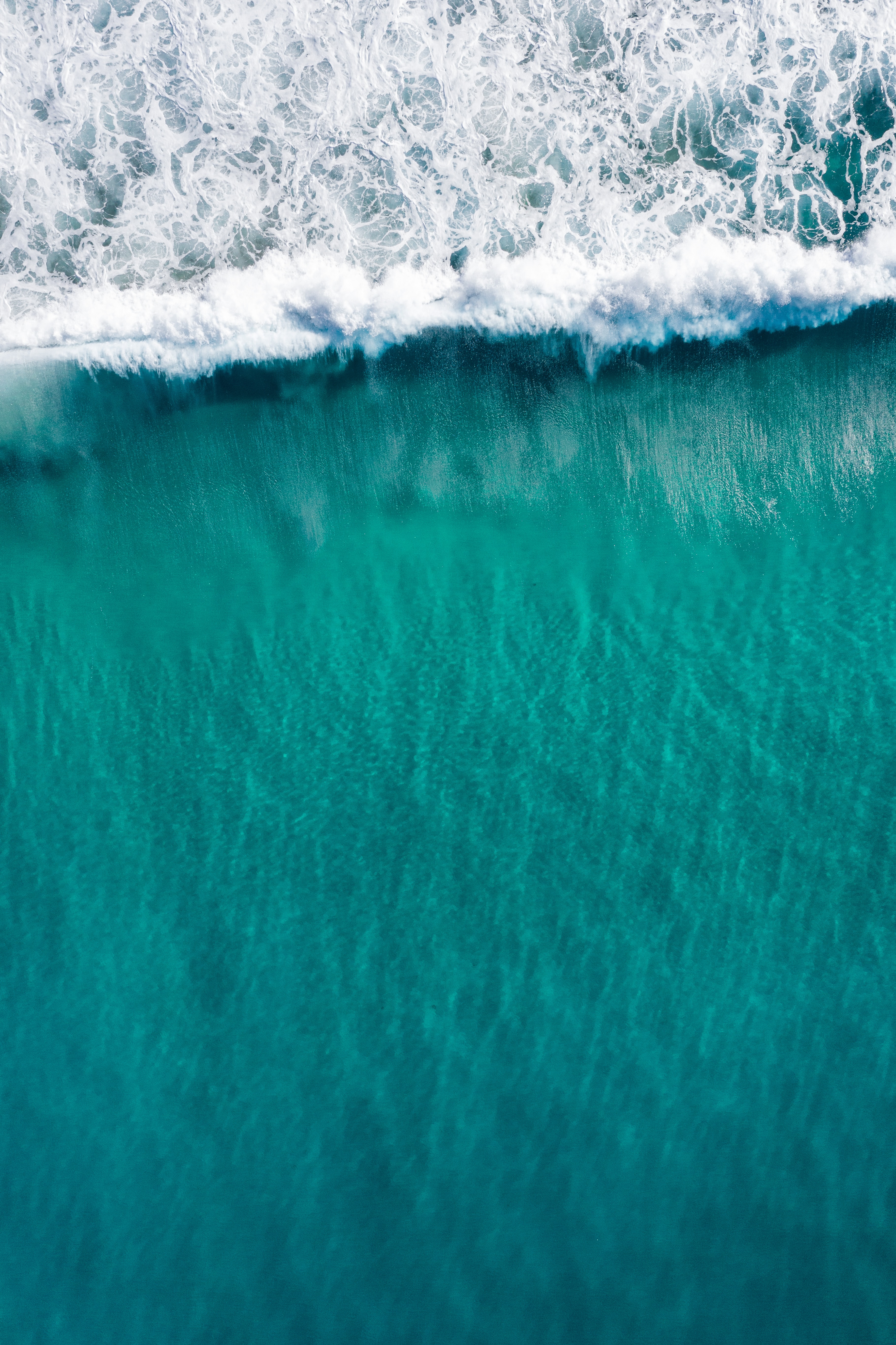 Download mobile wallpaper View From Above, Water, Wave, Sea, Nature for free.