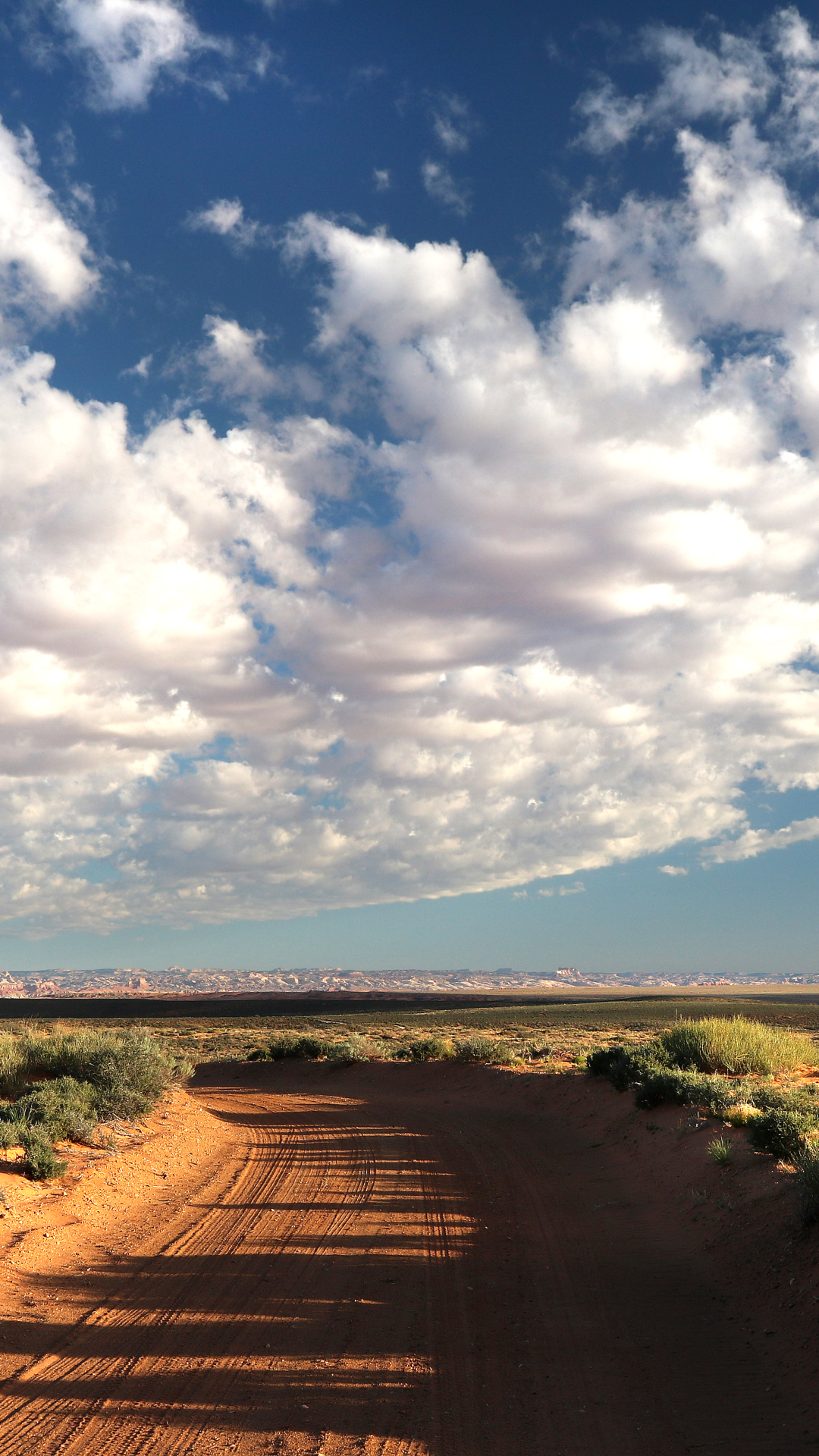 Download mobile wallpaper Landscape, Nature, Sky, Desert, Horizon, Earth, Cloud, Dirt Road for free.