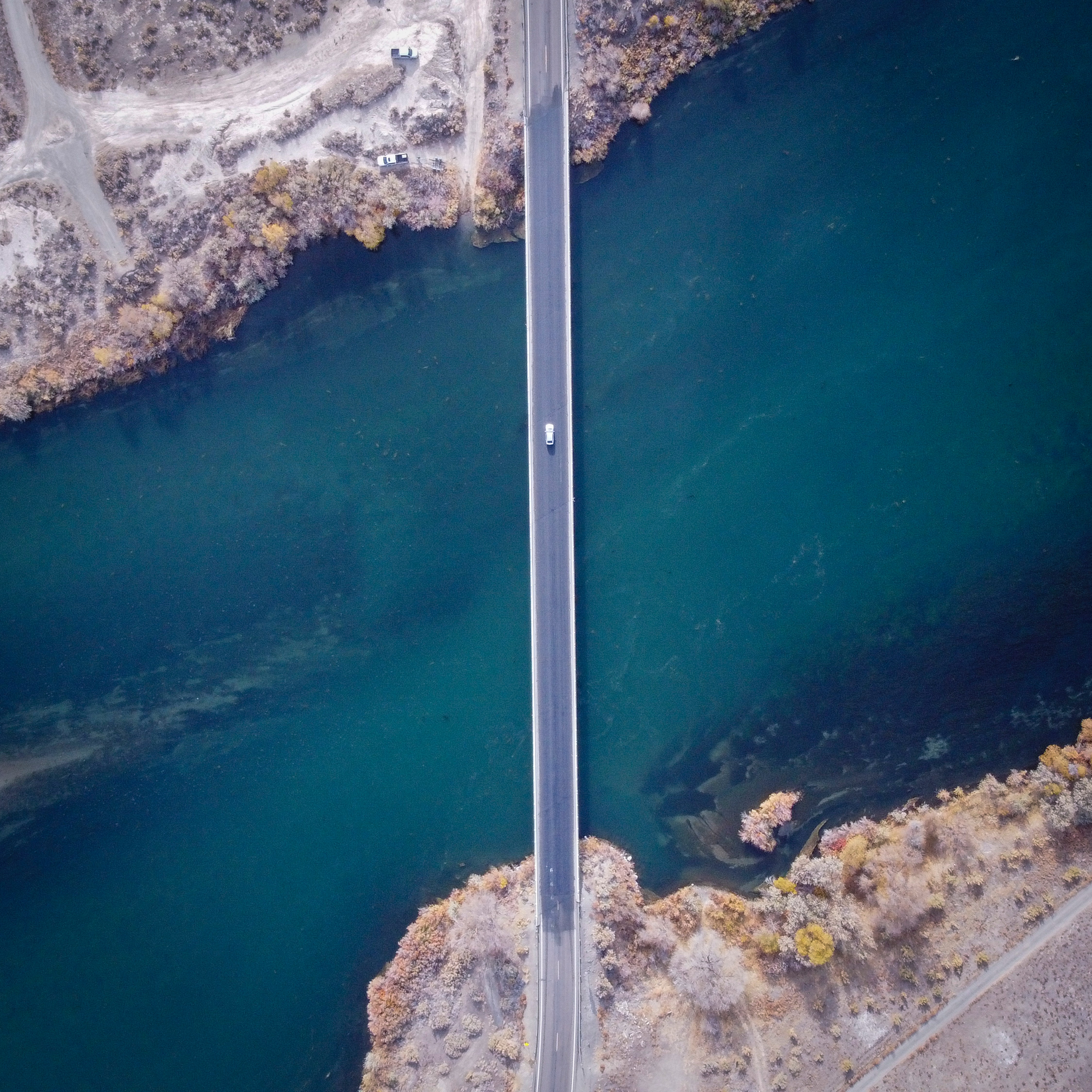 Download mobile wallpaper Shore, Bank, Miscellaneous, Bridge, Miscellanea, Rivers, View From Above, Car for free.