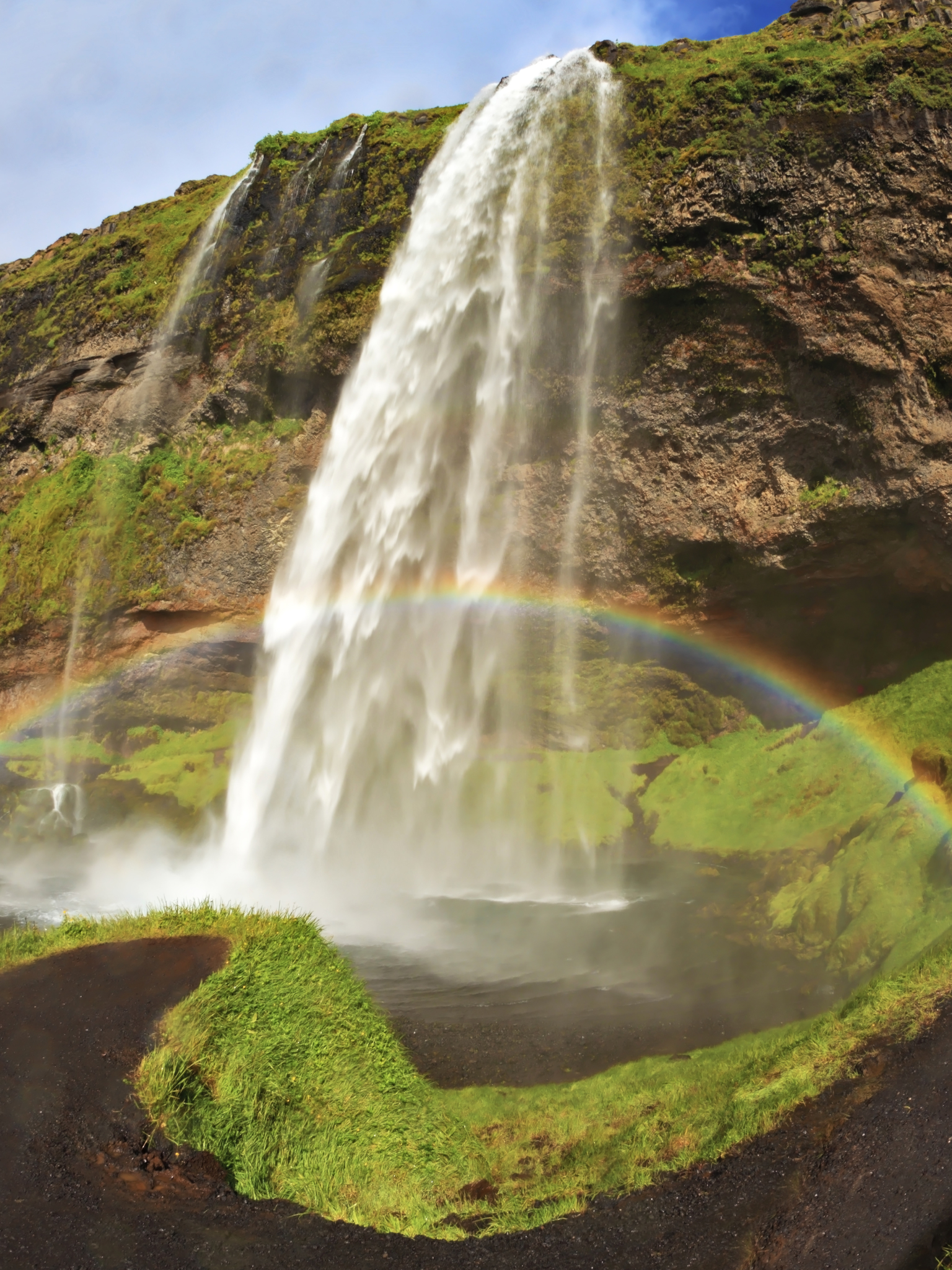 Download mobile wallpaper Grass, Waterfalls, Rainbow, Waterfall, Earth, Iceland, Seljalandsfoss for free.