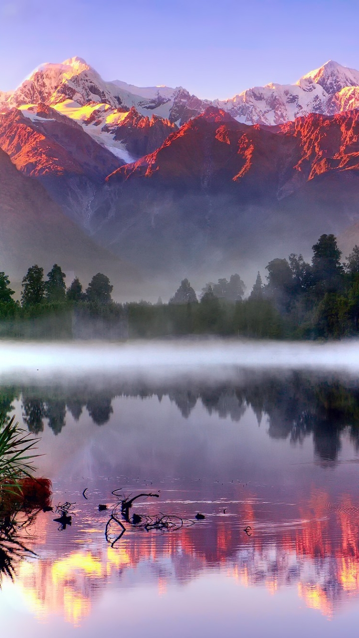 Download mobile wallpaper Mountains, Reflection, New Zealand, Earth, Sunlight, Mount Cook, Southern Alps, Lake Matheson, Aoraki/mount Cook, South Island (New Zealand) for free.