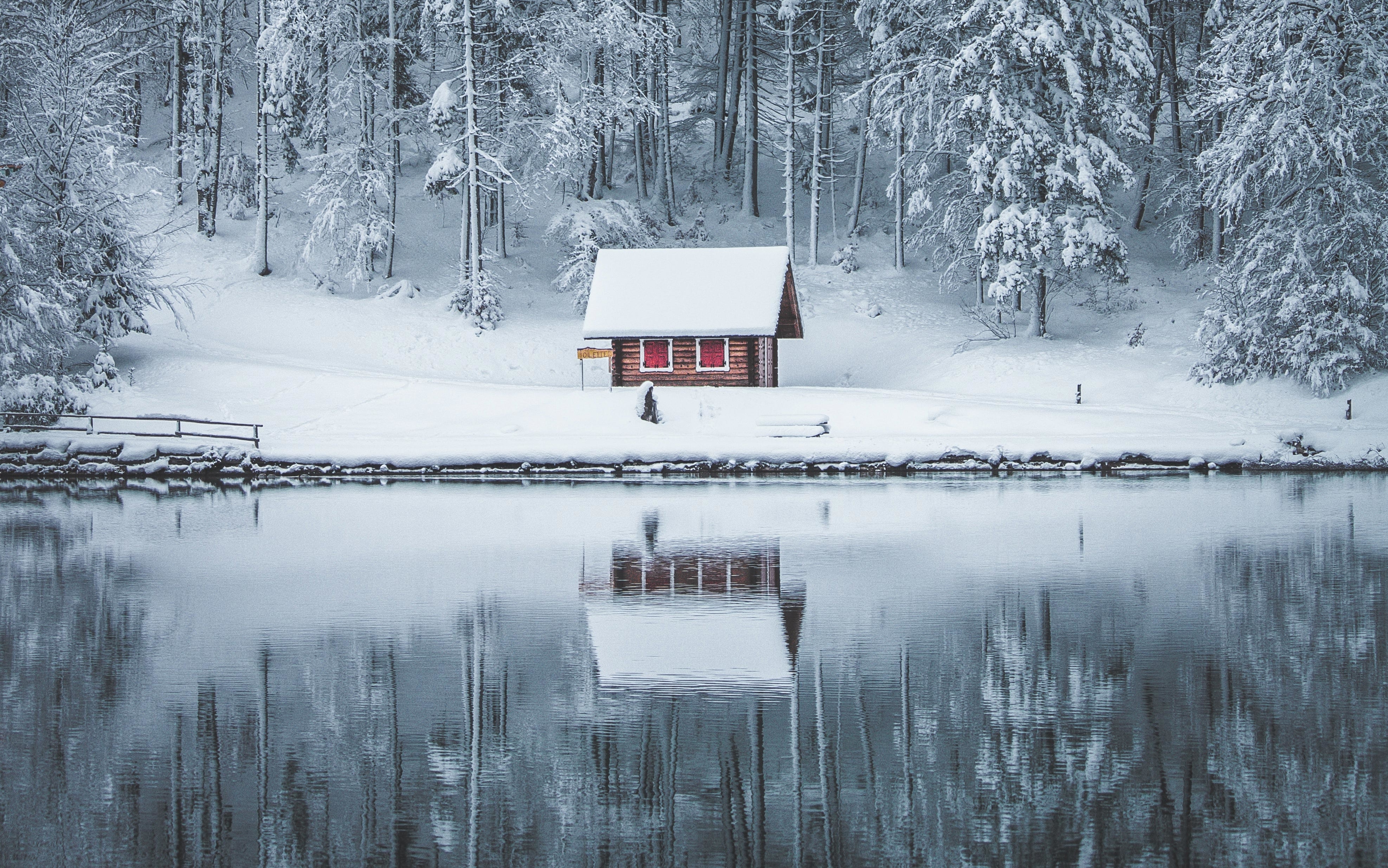 Download mobile wallpaper Winter, Snow, Lake, Reflection, Pond, Cabin, Man Made for free.