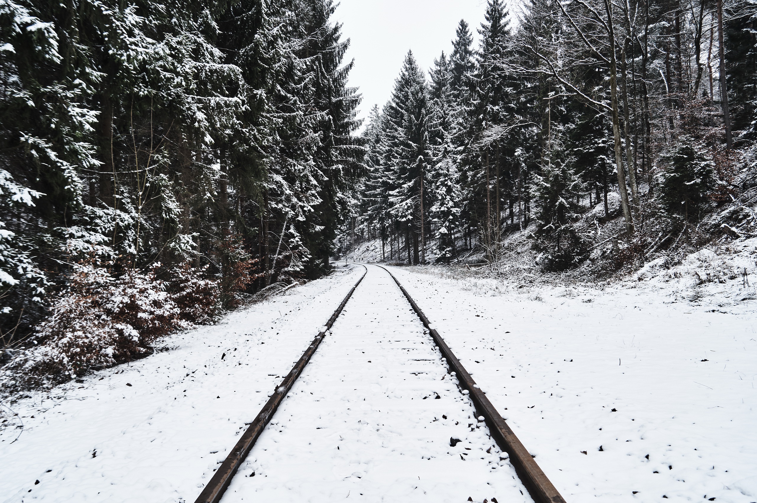 Download mobile wallpaper Winter, Nature, Snow, Forest, Railroad, Man Made for free.