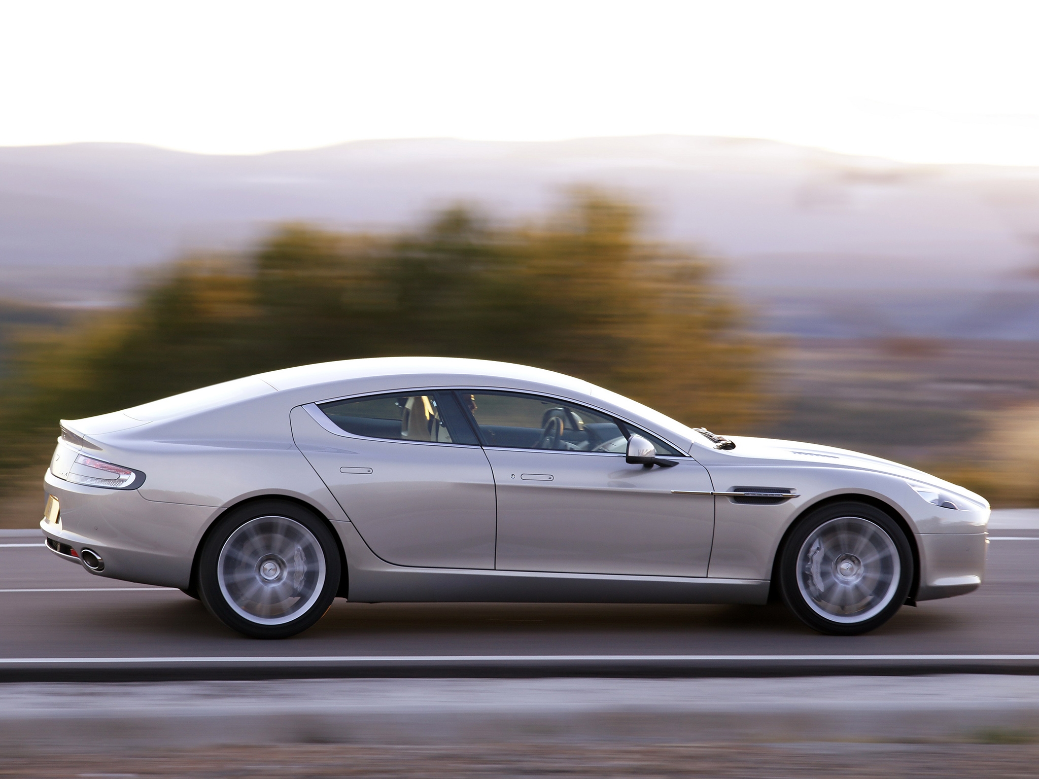 Download mobile wallpaper 2009, Rapide, Side View, Speed, Aston Martin, Silver, Cars for free.