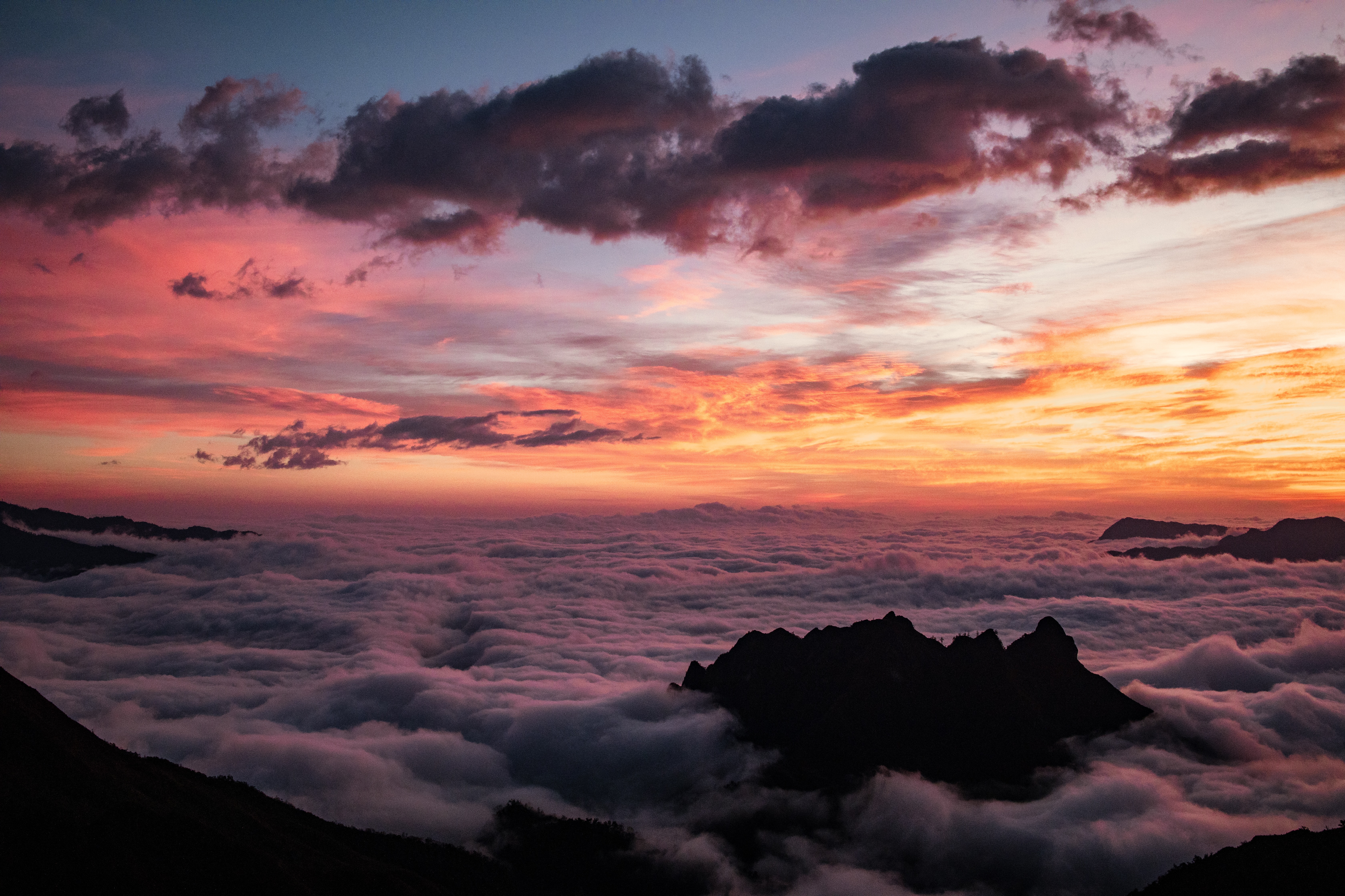 Download mobile wallpaper Clouds, Fog, Mountains, Nature, Sunset, Dark for free.