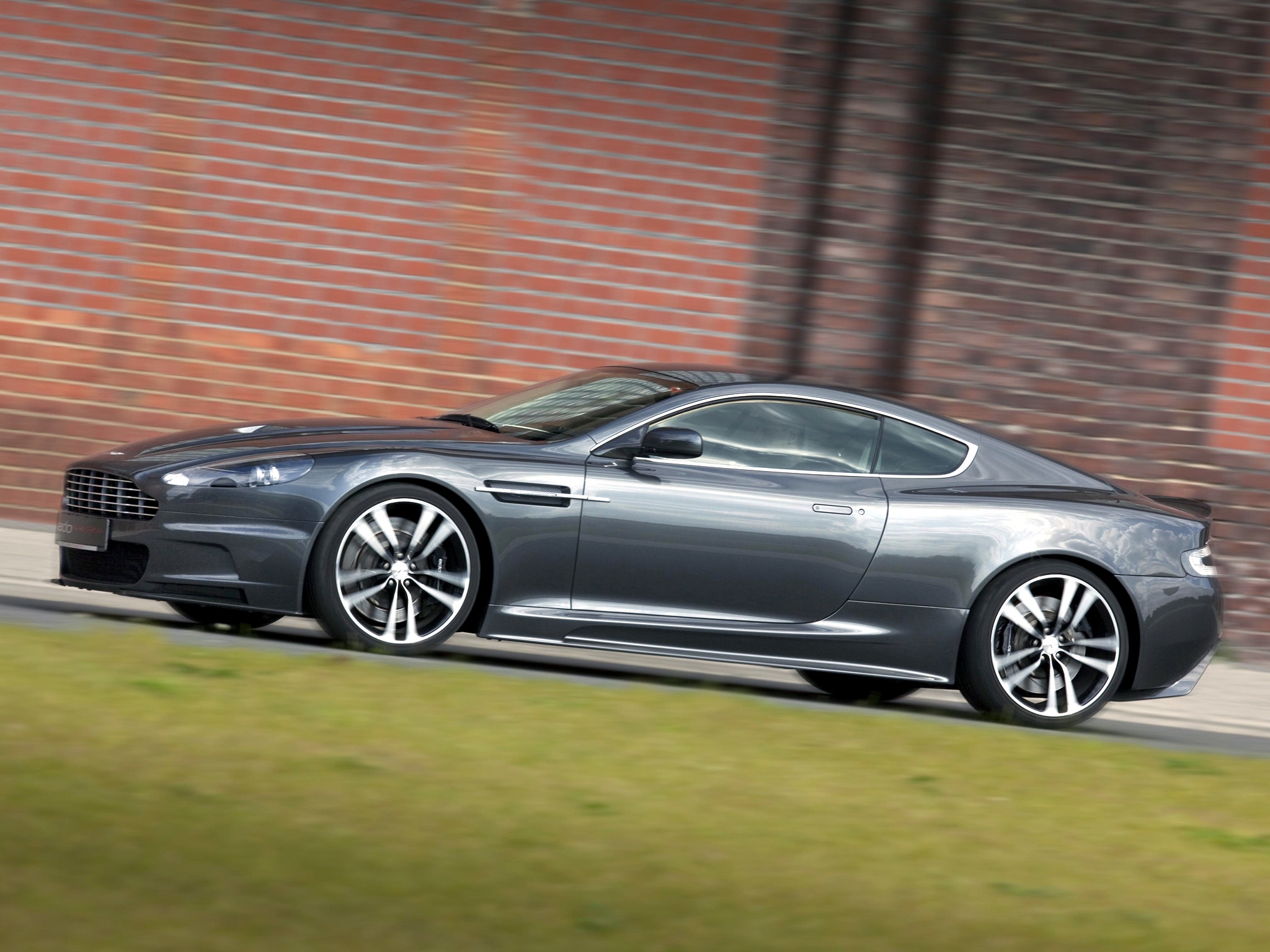 Mobile wallpaper style, grass, aston martin, cars, grey, side view, dbs, 2010