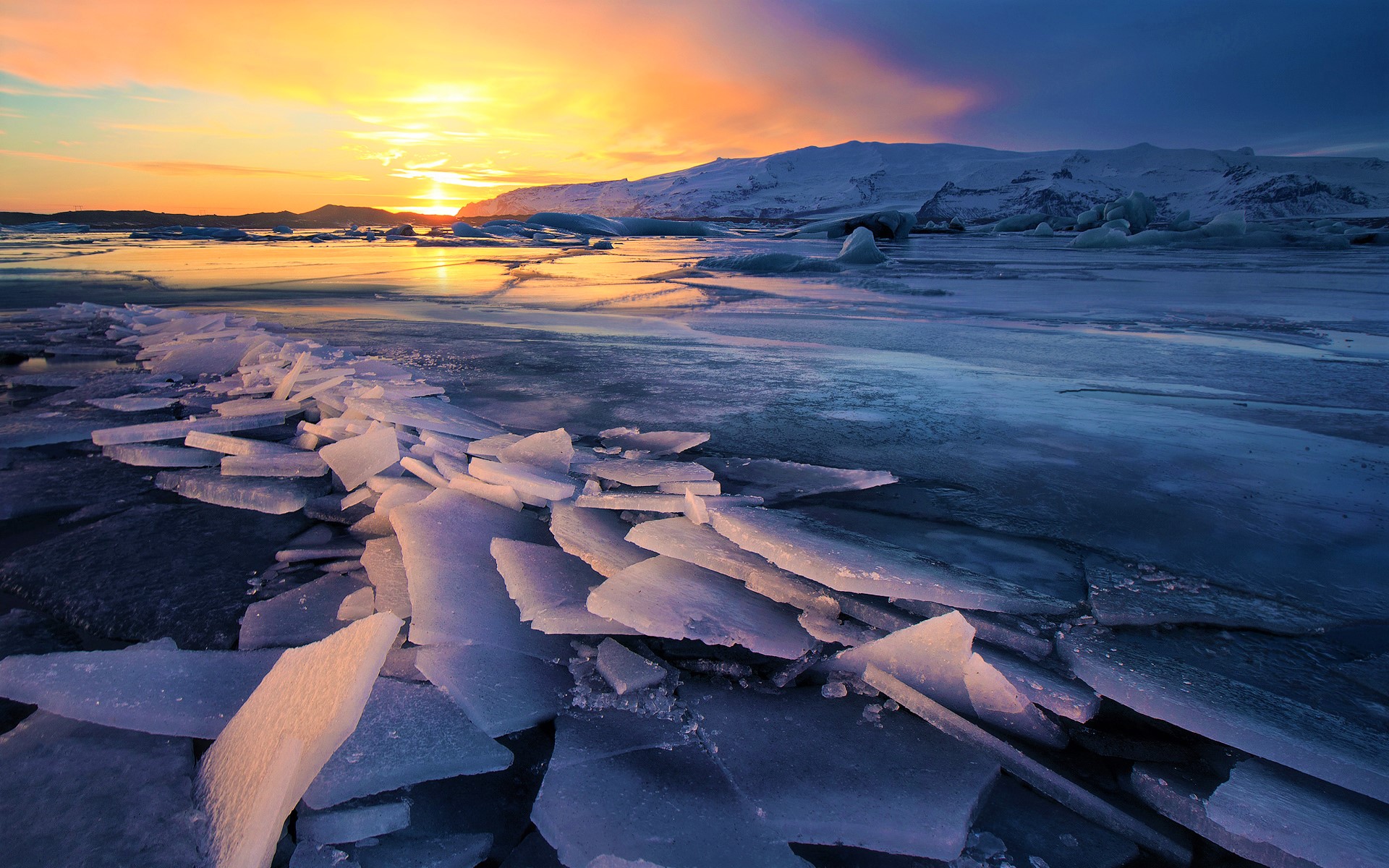 Скачати мобільні шпалери Зима, Лід, Земля, Льодовик, Ісландія, Захід Сонця безкоштовно.