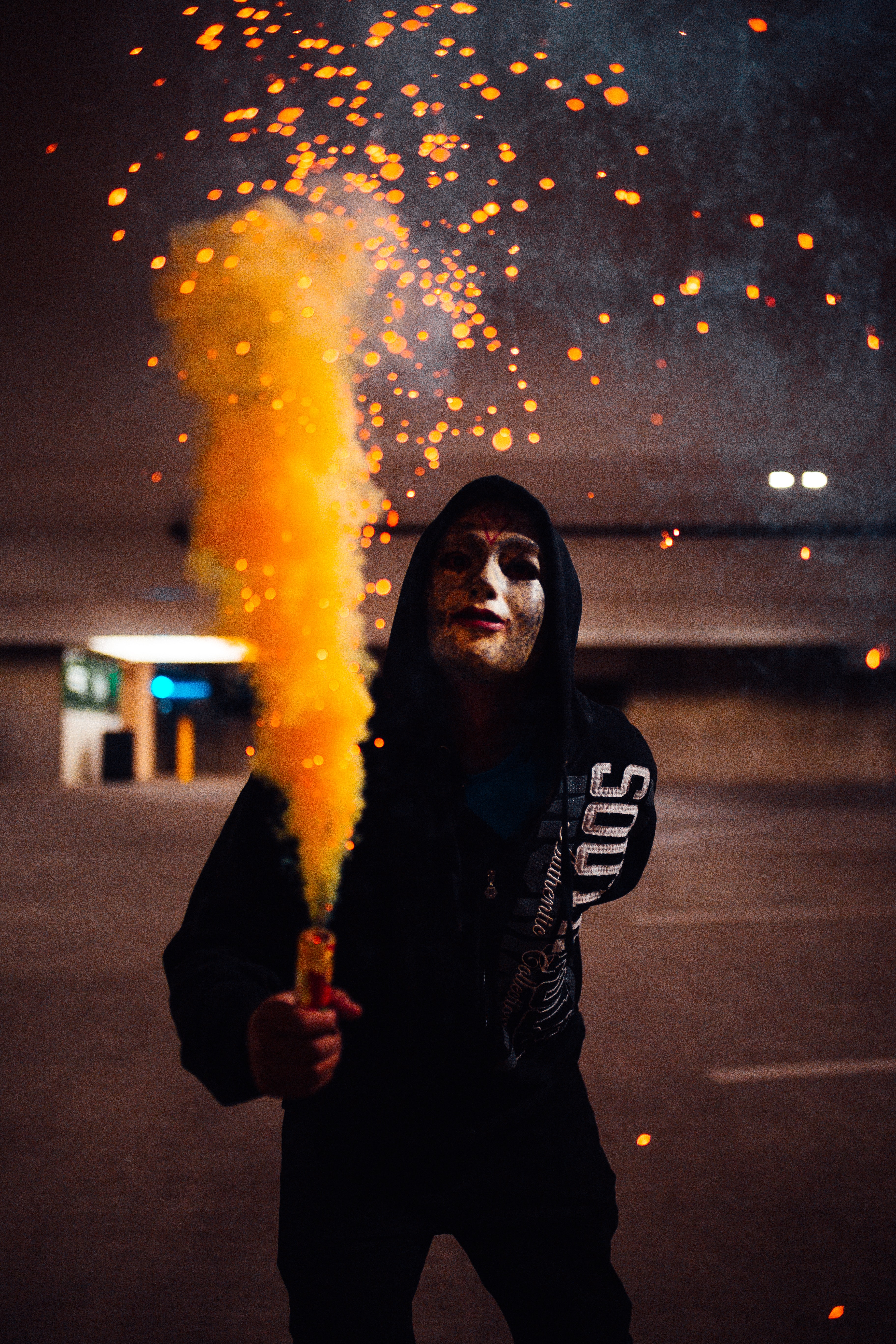 Free download wallpaper Sparks, Miscellanea, Miscellaneous, Coloured Smoke, Colored Smoke, Hood, Mask, Anonymous on your PC desktop