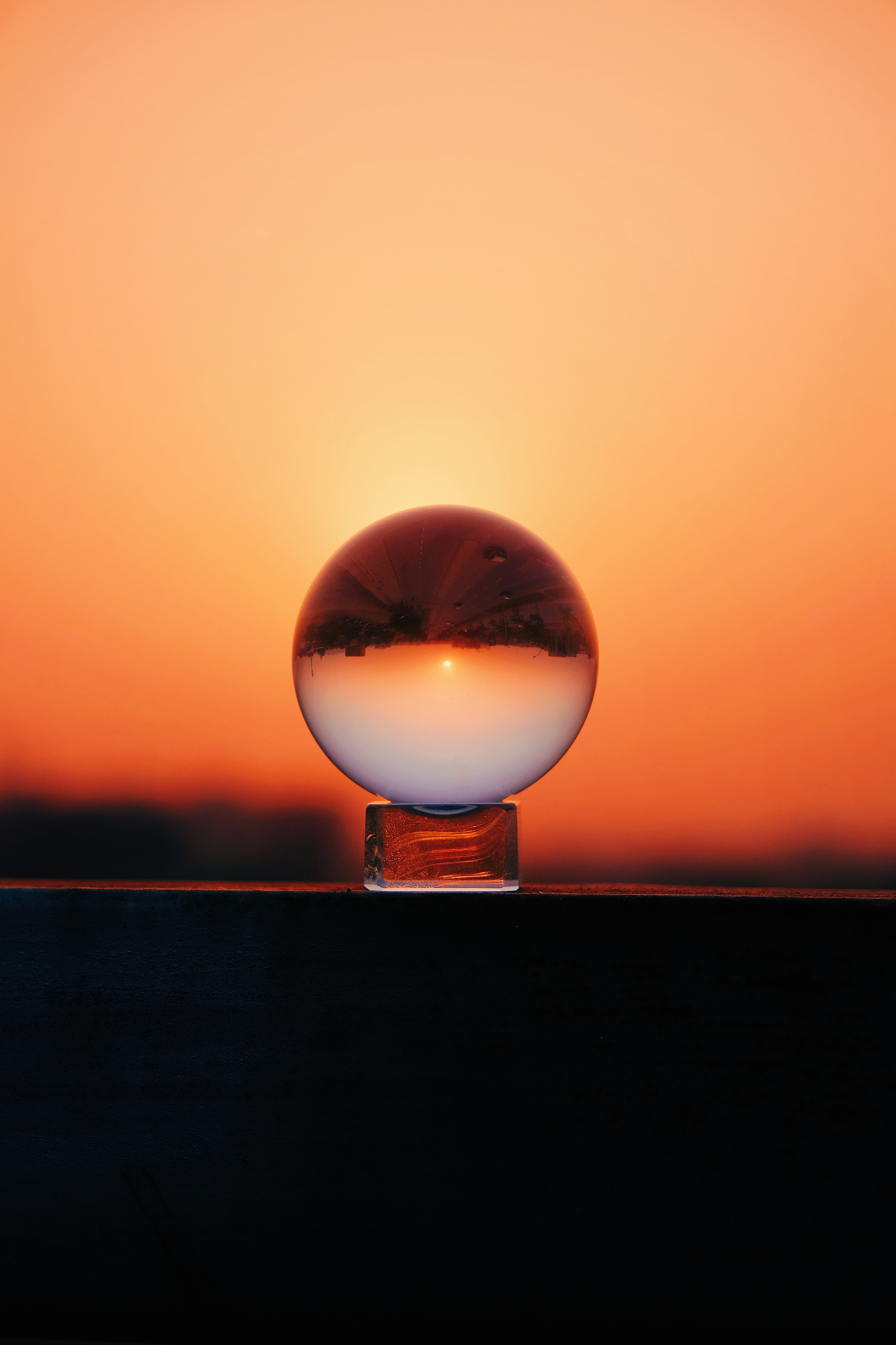 Download mobile wallpaper Reflection, Sky, Macro, Sunset, Ball, Glass for free.