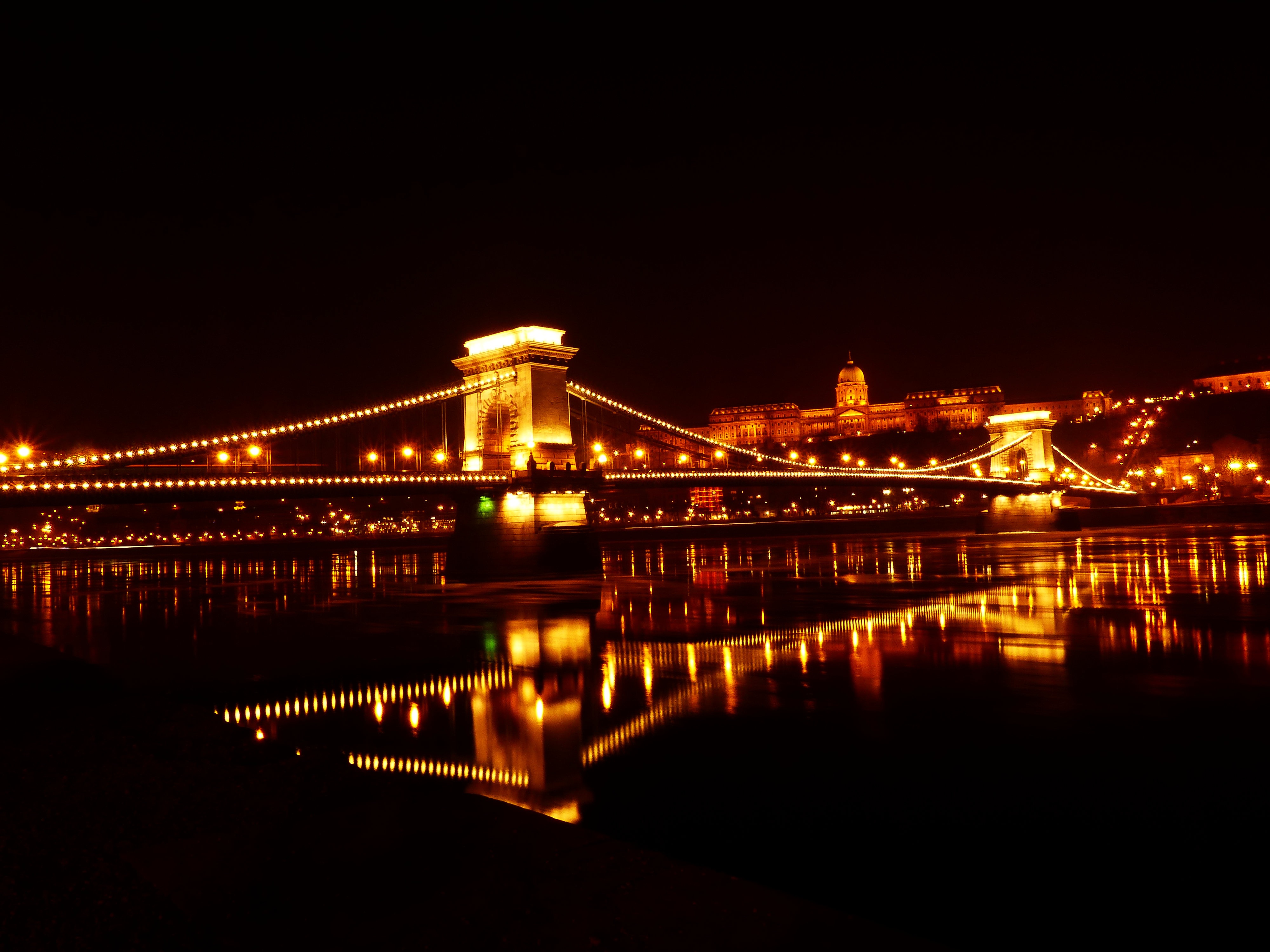 Download mobile wallpaper Bridges, Night, Reflection, Light, Bridge, Hungary, Budapest, Man Made, Chain Bridge for free.