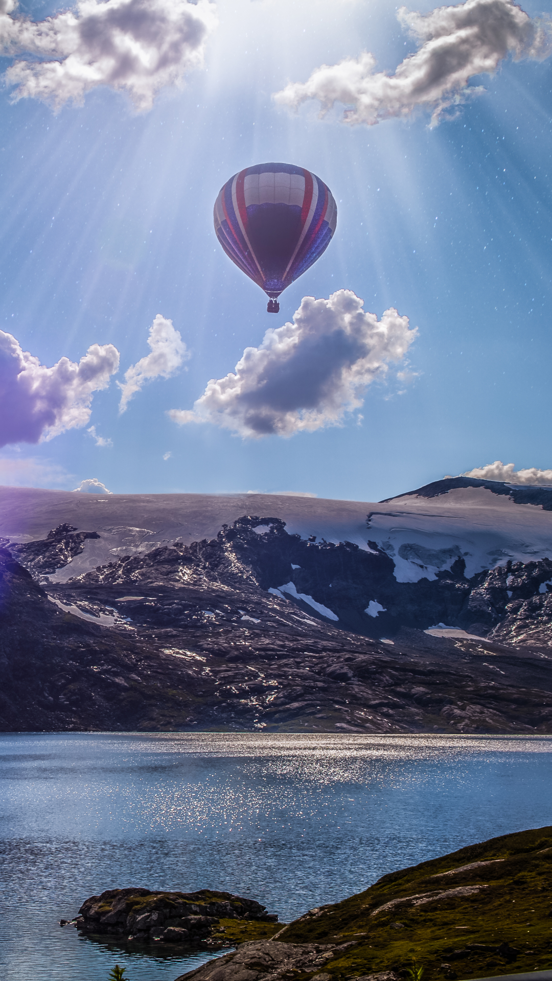 Download mobile wallpaper Norway, Cloud, Scandinavia, Sunbeam, Vehicles, Hot Air Balloon, Sunshine, Sunbean for free.