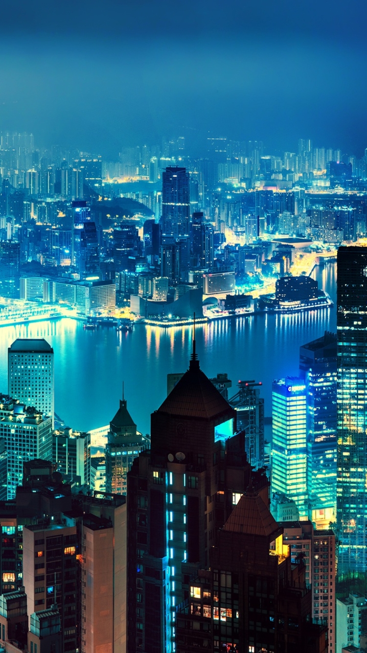 Download mobile wallpaper Cities, Night, Skyscraper, Building, Light, Panorama, Cityscape, China, River, Hong Kong, Man Made for free.