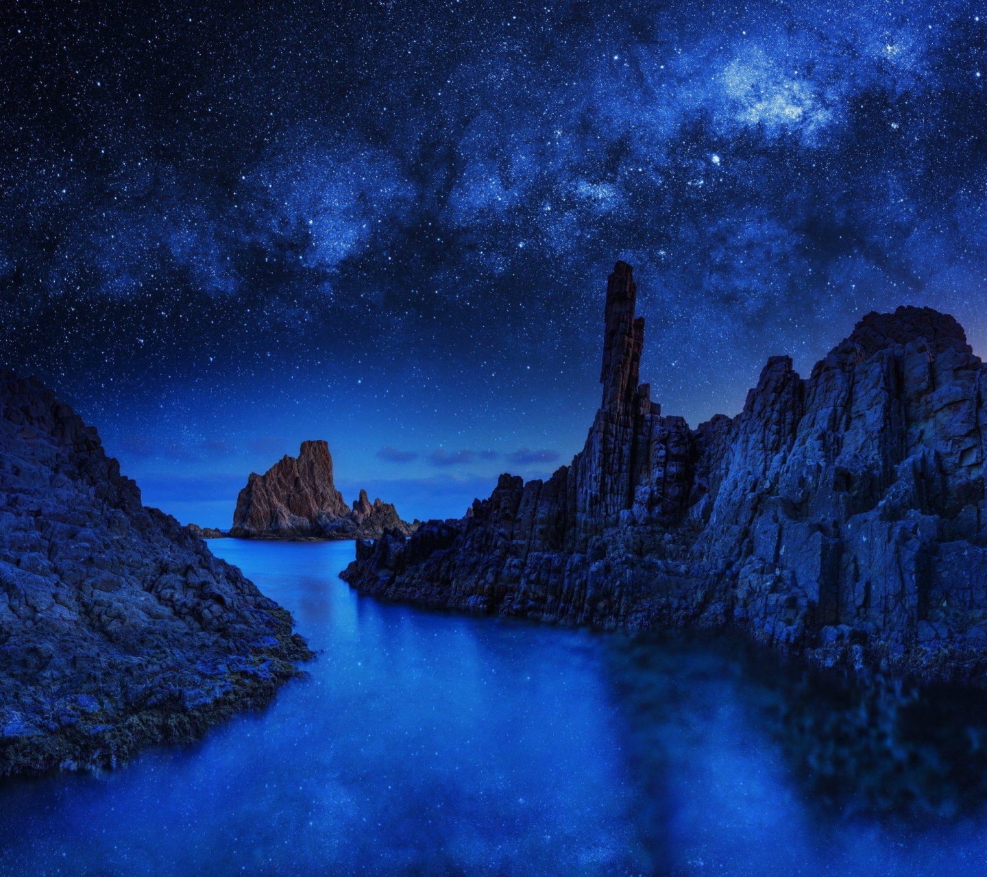 Download mobile wallpaper Nature, Sky, Night, Rock, Starry Sky, Earth for free.
