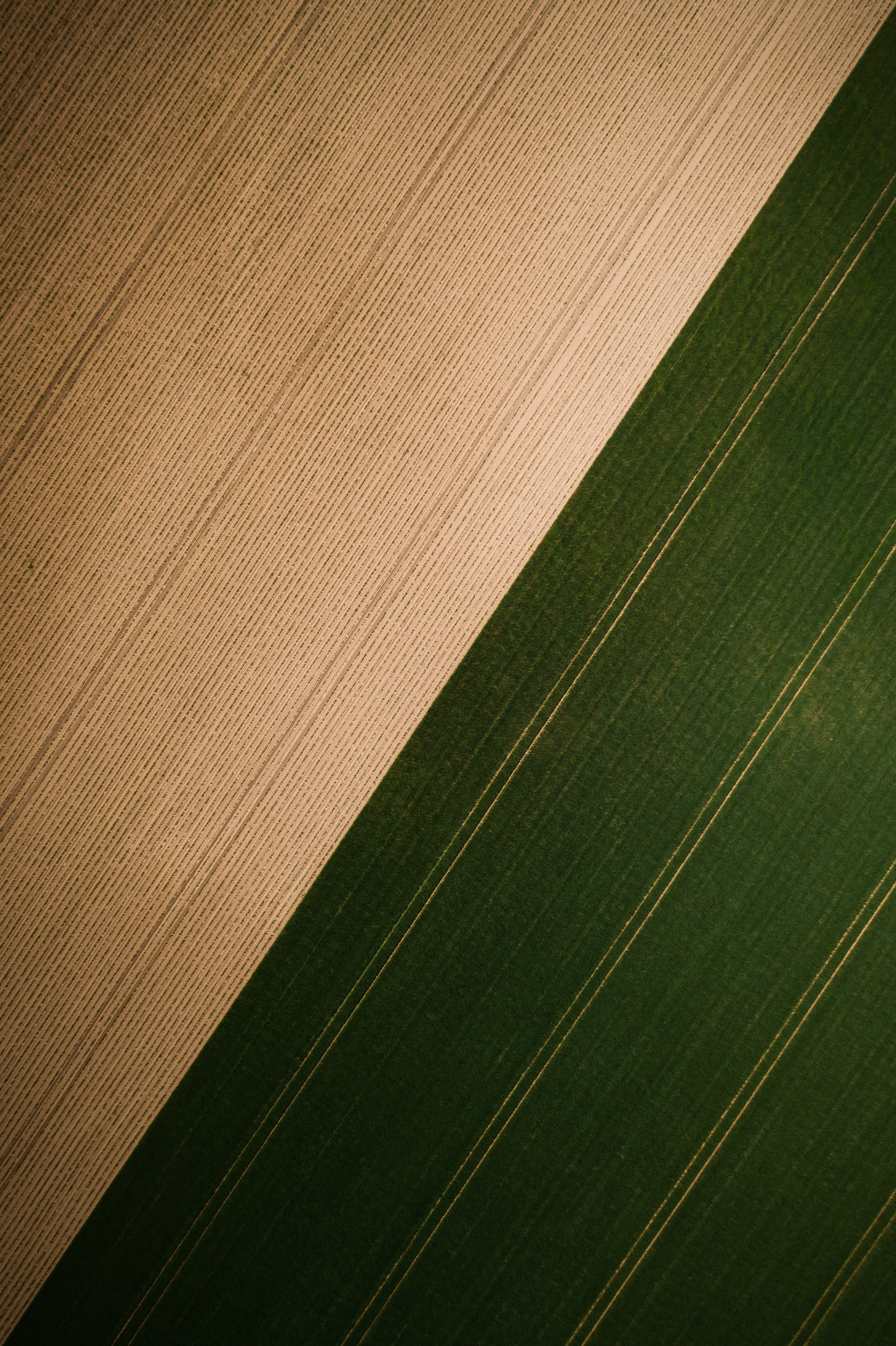 Download mobile wallpaper Stripes, Field, View From Above, Grass, Streaks, Texture, Textures for free.