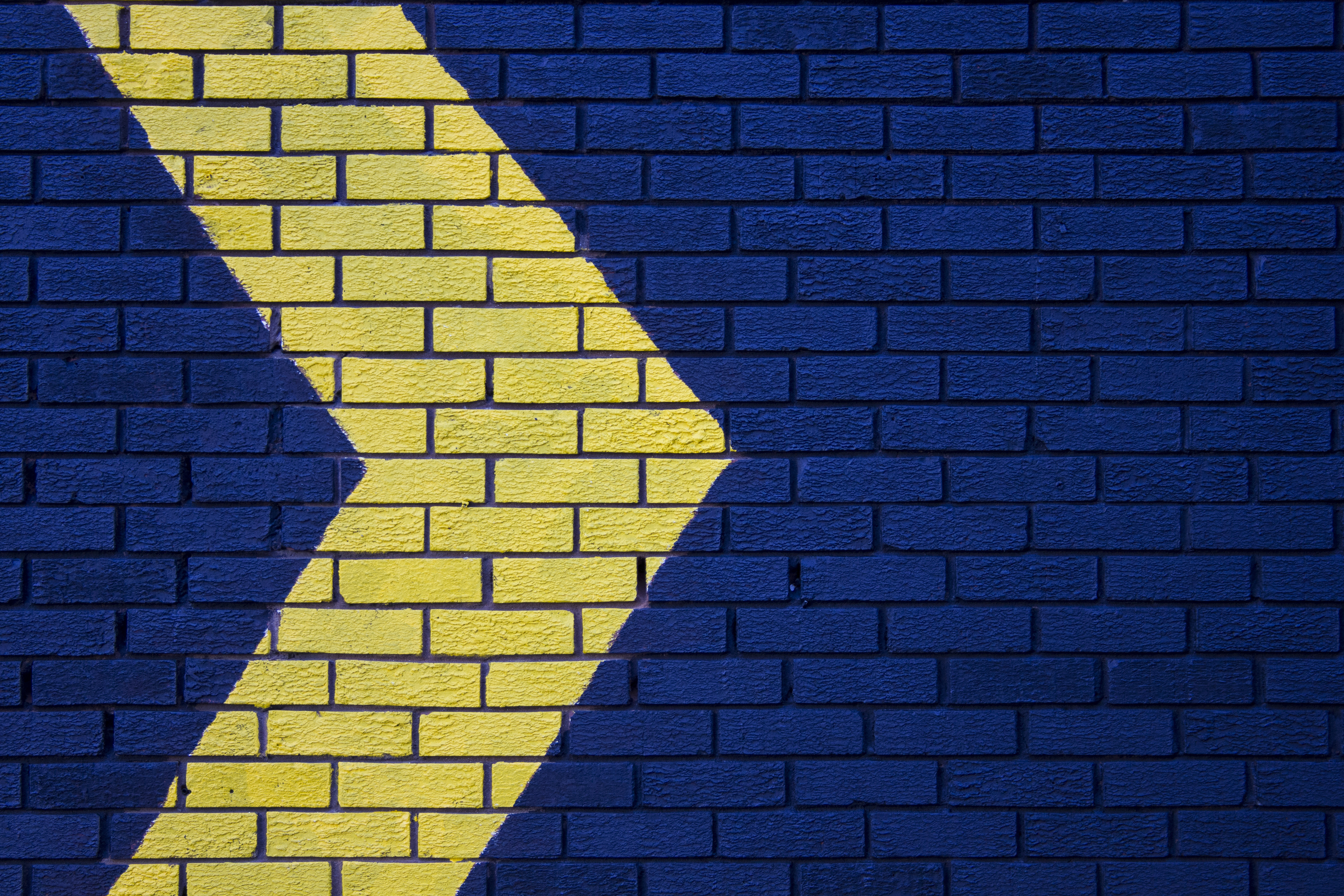 yellow, texture, wall, blue, textures, arrow, pointer, direction, brick iphone wallpaper
