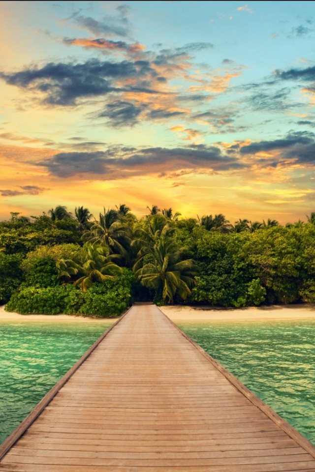 Download mobile wallpaper Sunset, Sea, Pier, Ocean, Earth, Tropics, Island, Lagoon, Tropical, Palm Tree for free.