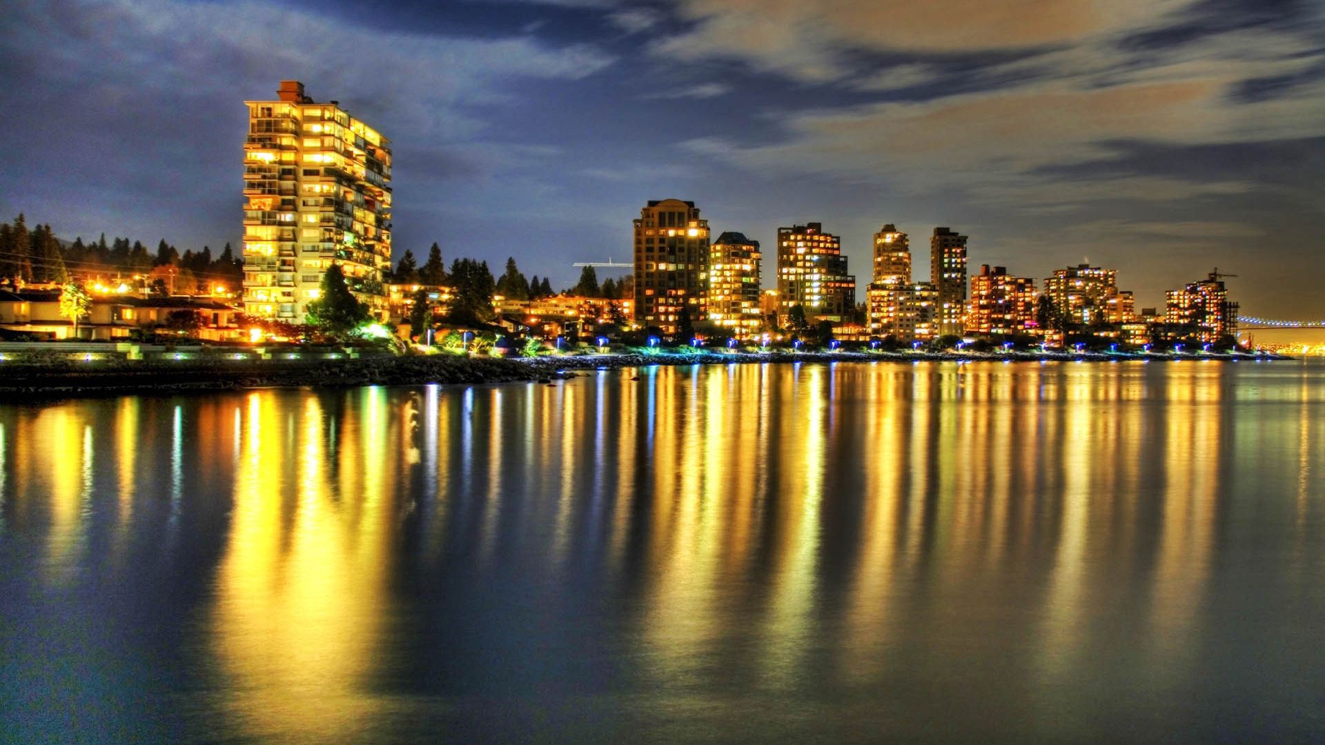 Download mobile wallpaper Reflection, Shore, Bank, Rivers, Building, Cities, Night for free.