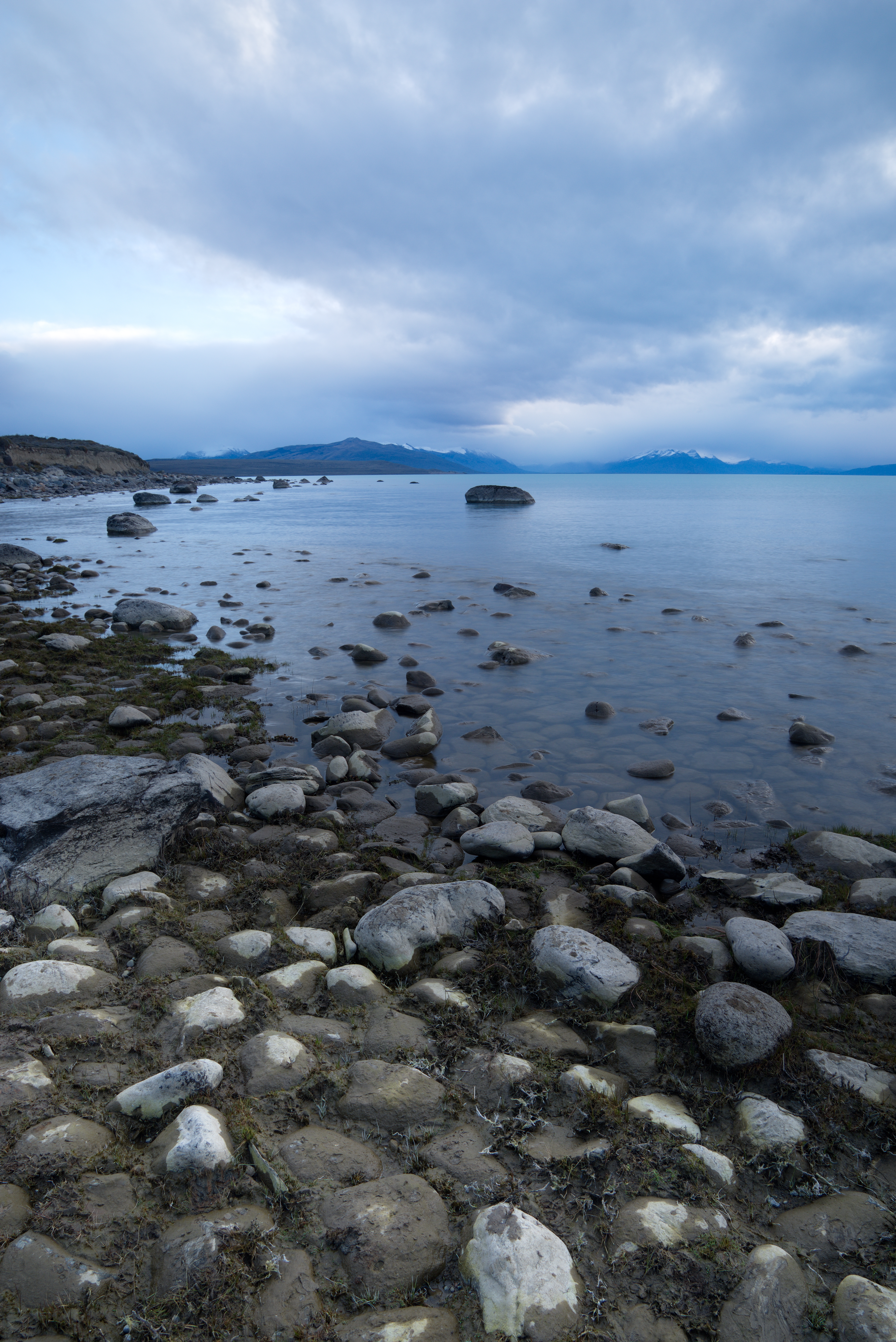 Download mobile wallpaper Clouds, Nature, Mountains, Stones, Horizon, Lake for free.