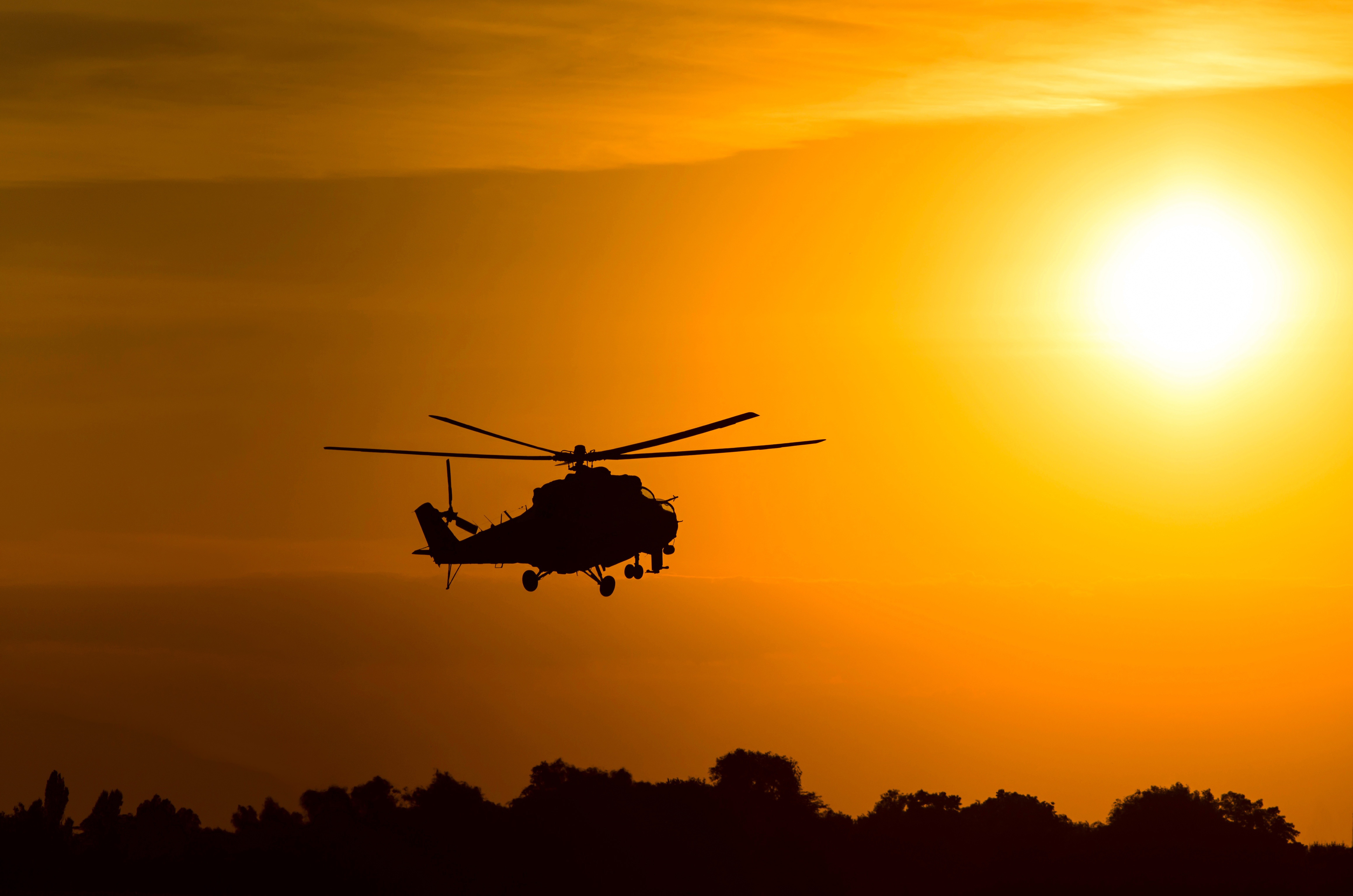 Download mobile wallpaper Sunset, Silhouette, Helicopter, Military, Orange (Color), Mil Mi 24, Attack Helicopter, Military Helicopters for free.