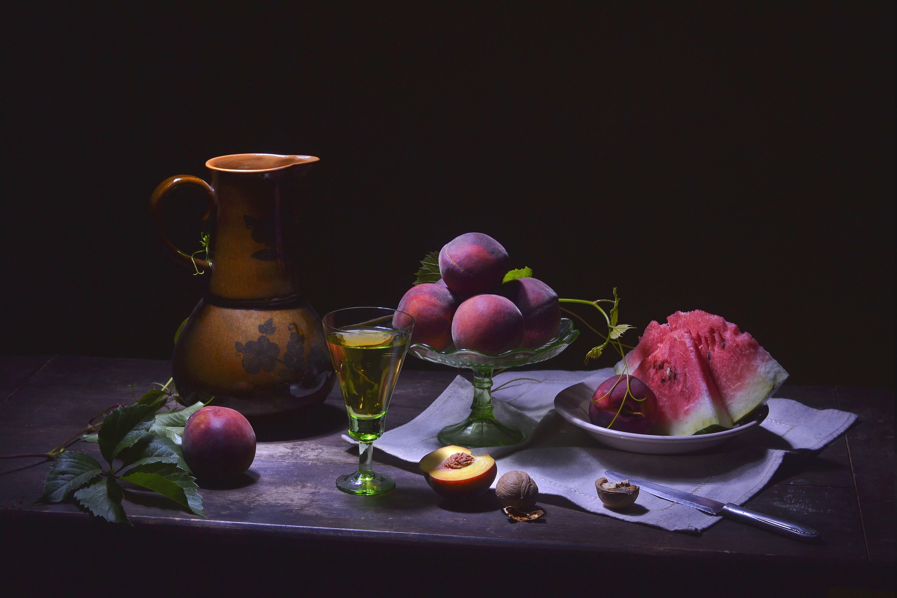 Download mobile wallpaper Food, Still Life, Glass, Watermelon, Nut, Peach, Pitcher for free.