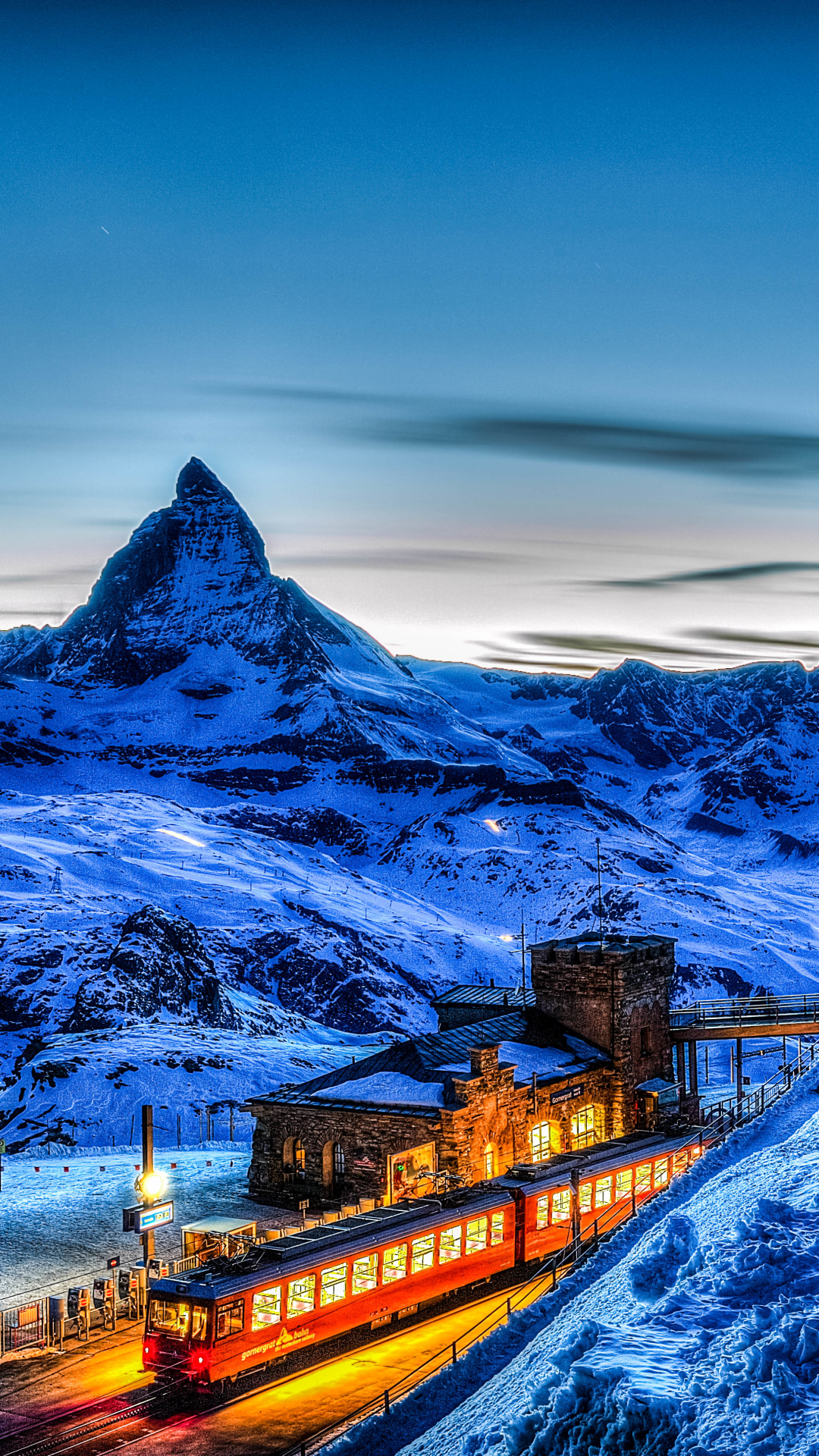 Download mobile wallpaper Winter, Snow, Mountain, Alps, Switzerland, Train, Matterhorn, Vehicle, Vehicles for free.